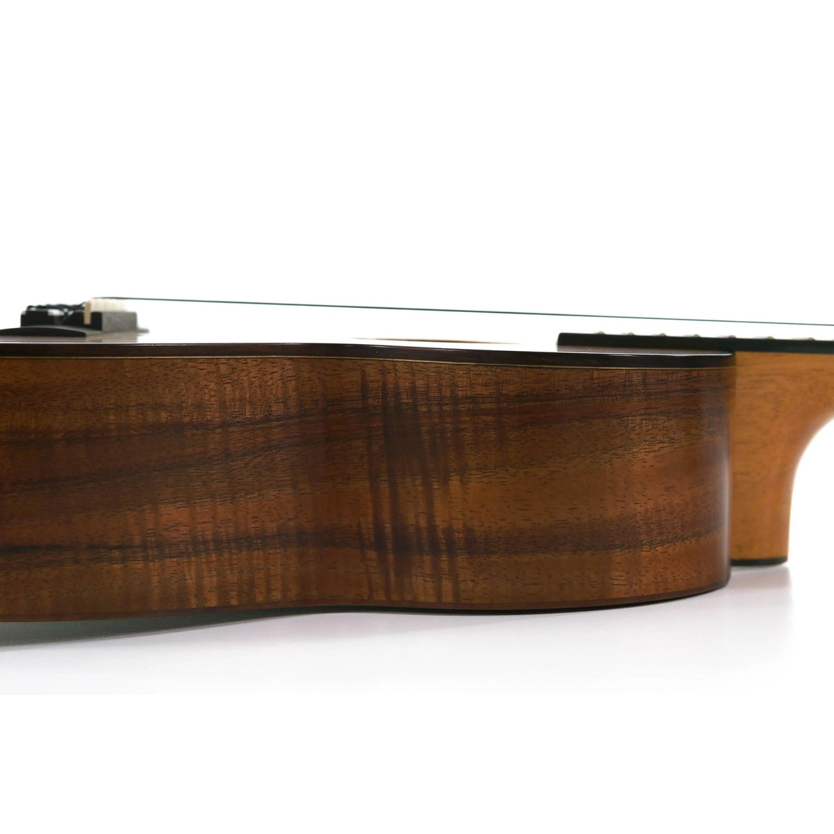 Kamaka HF-3-DC tenor ukulele side view showing curly koa side and satin finish