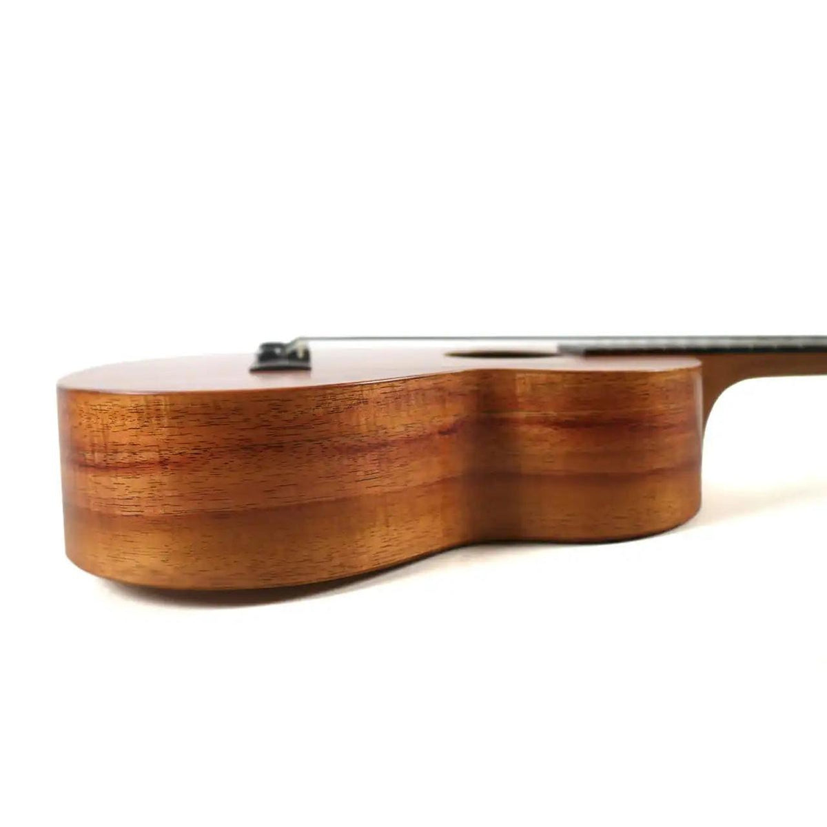 Kamaka HF-3 tenor ukulele side view showing koa sides and satin finish