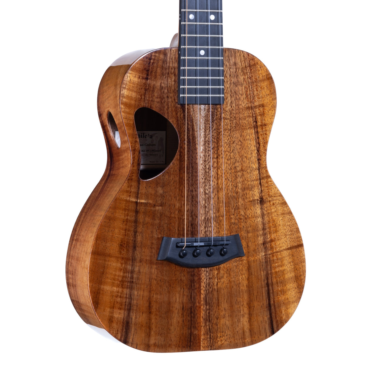 Close-up of the Hawaiian koa top, ebony bridge and D-shaped soundhole on Kanile'a D-1 Pro tenor ukulele, serial 30186
