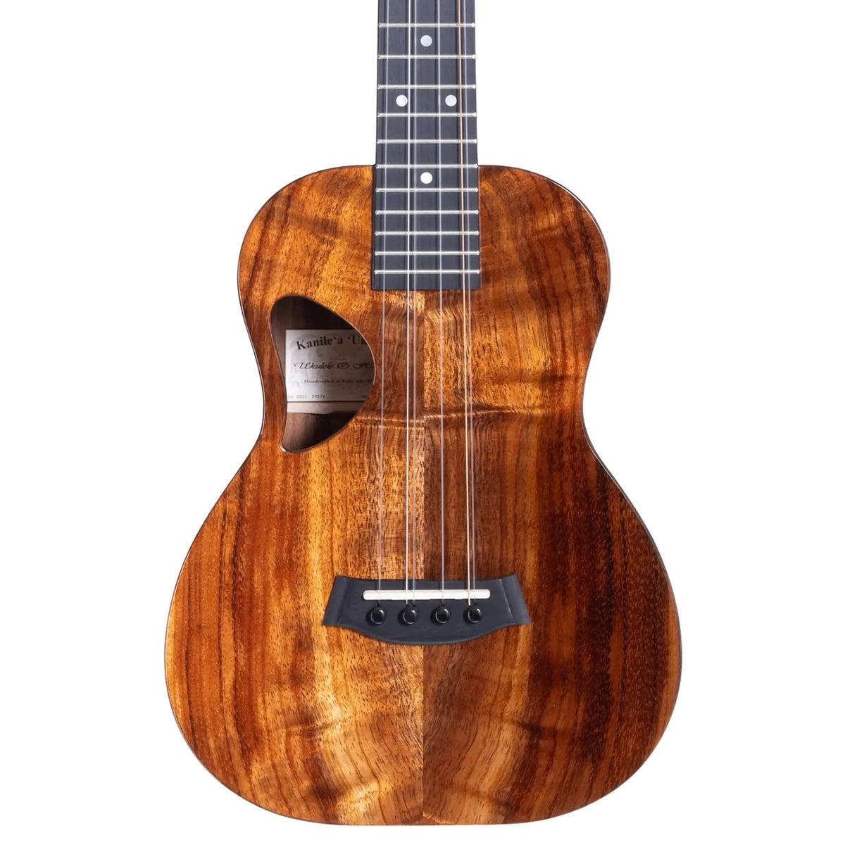 Example photo: an earlier Kanile'a D-1 Core 6-string tenor, body front with Deluxe Grade koa top and D-shaped soundhole