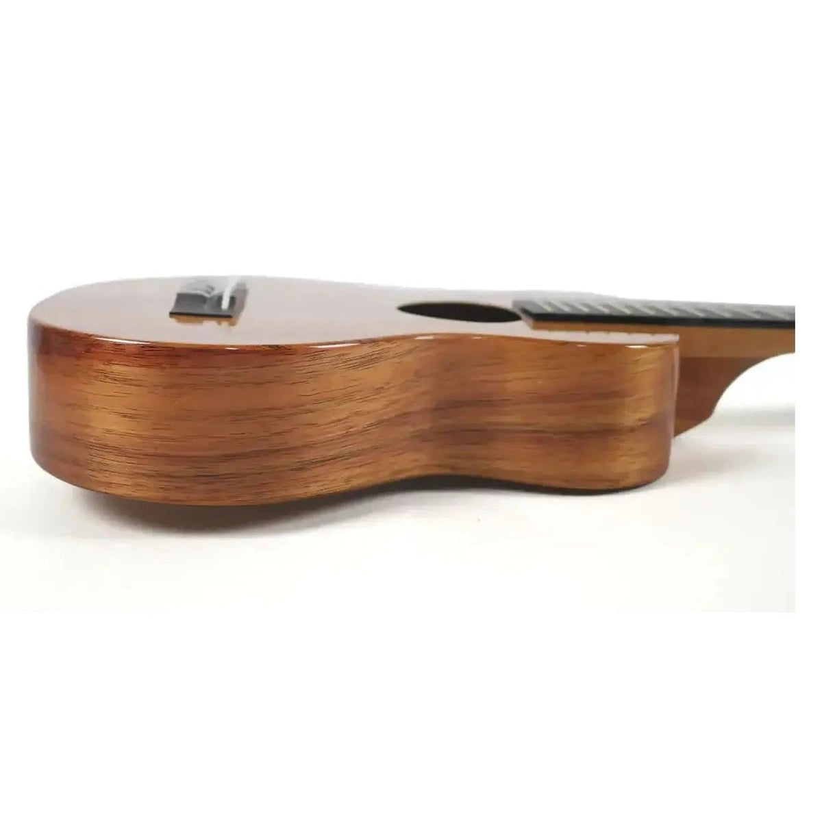 Example photo: side view of a KoAloha solid koa concert ukulele (representative photo), showing the body depth and koa sides