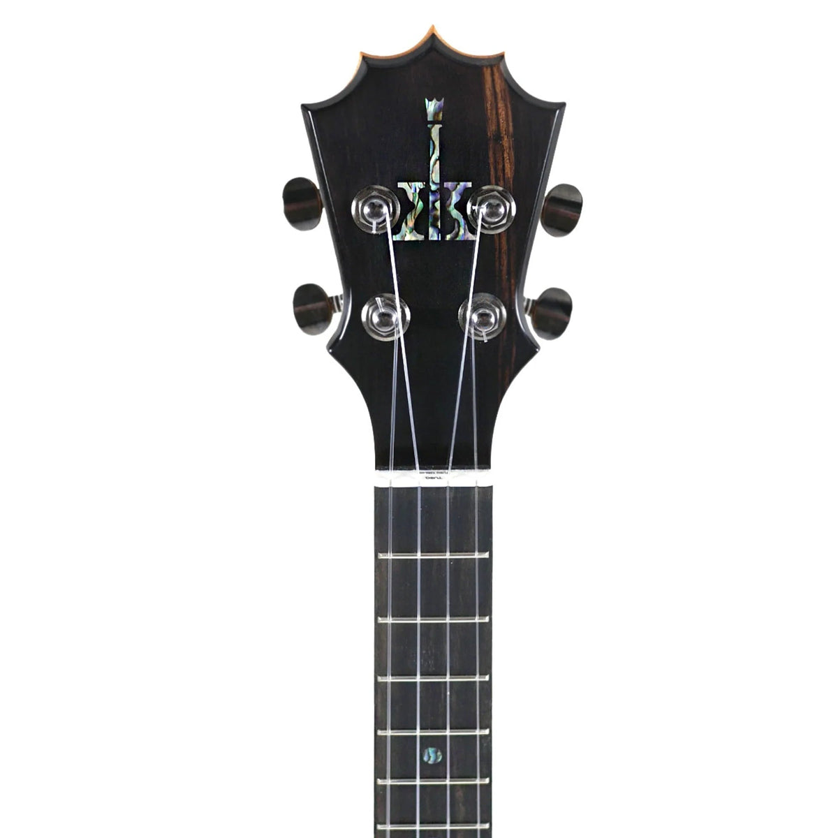 Example photo: headstock front of a KoAloha KTM-00 gloss tenor, black ebony head plate with the 5-pointed crown and abalone logo (the same head plate as a gloss KCM-00MG; concert tuners have orange tips)