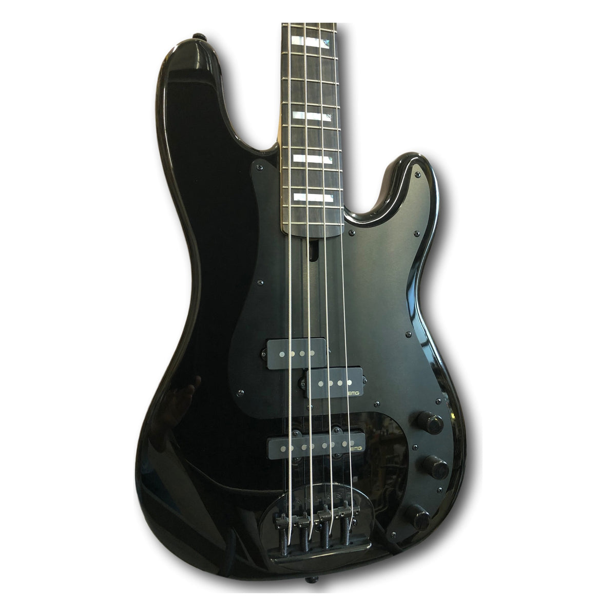 Angled close-up of the Lakland 44-64 Custom GZ black body showing the EMG P and J pickups, black anodized pickguard and black Dual Access bridge
