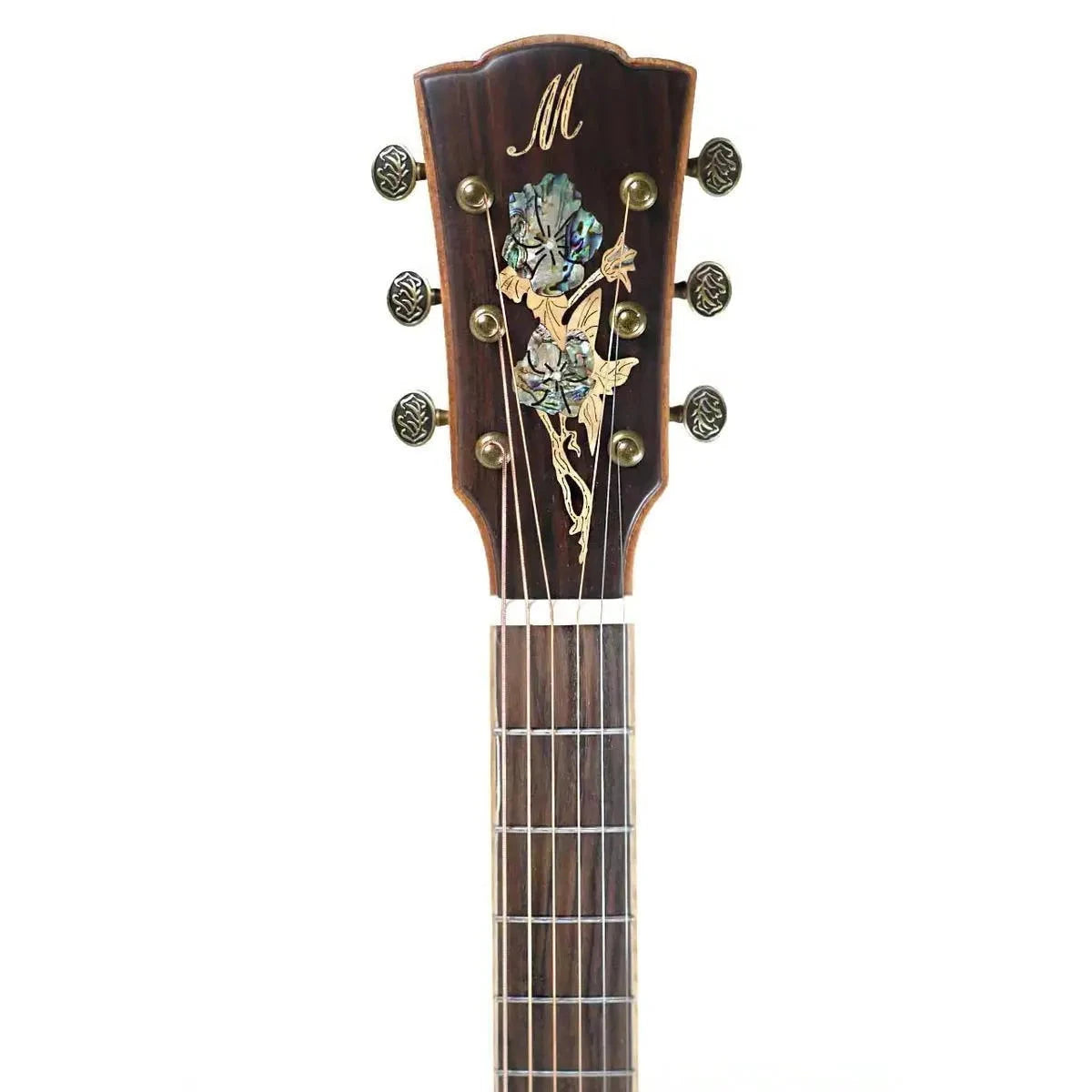 Mérida DG20FOLC-EQ Diana Series acoustic-electric guitar headstock with ornate abalone and gold floral inlay.