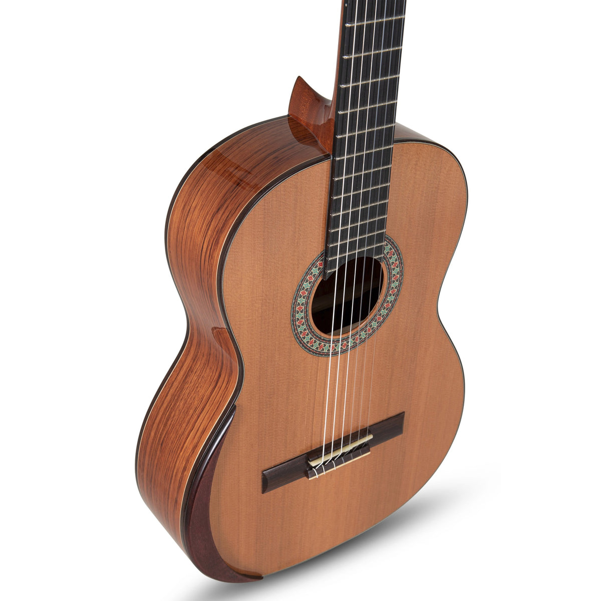Angled view of the Manuel Rodriguez Superior A-C classical guitar showing the cedar top and bubinga sides