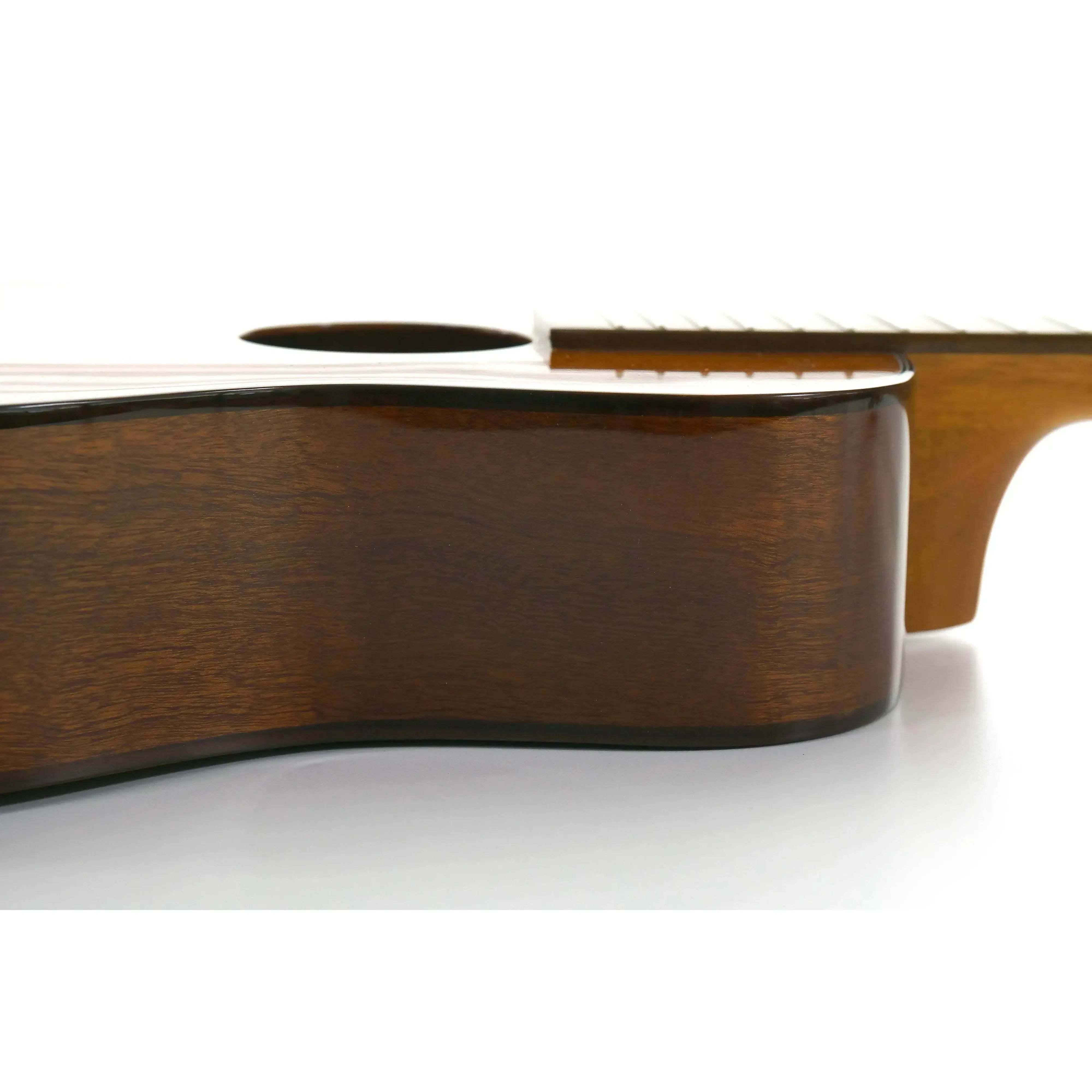Ohana BK-35G Baritone Ukulele, close-up of glossy dark mahogany body and neck.