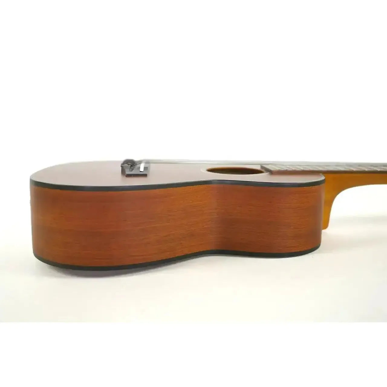 Ohana CK-14E-CL Concert Ukulele, side view, showing mahogany laminate body with black binding.