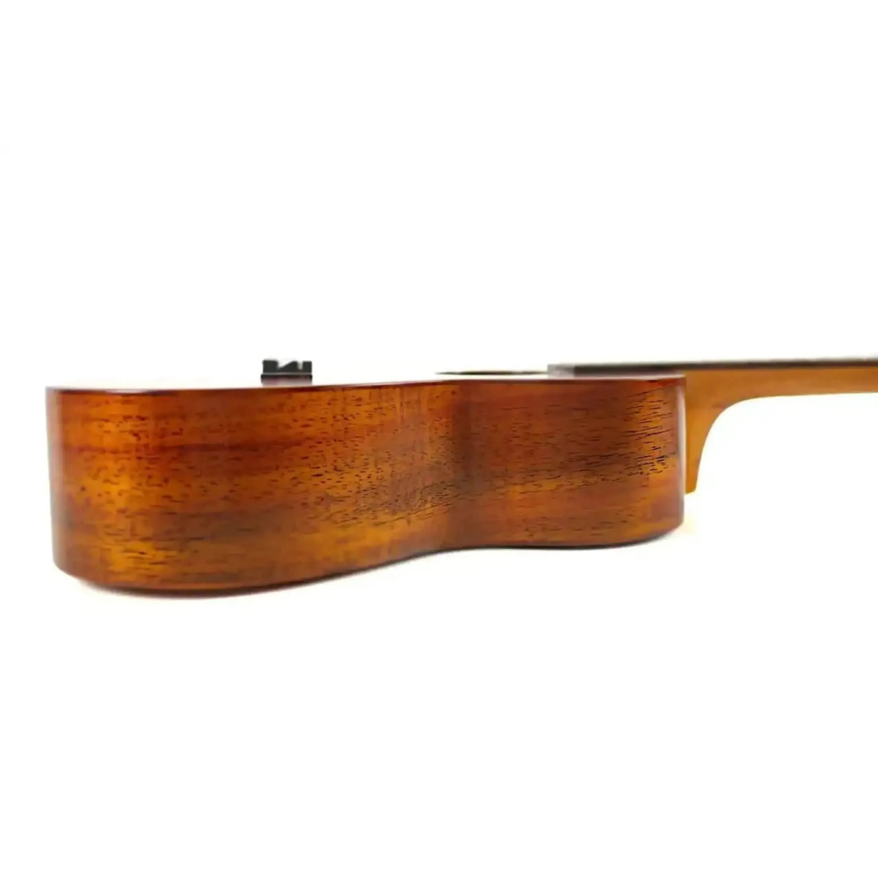 Side view of an Ohana CK-450 solid koa concert ukulele, showing its rich brown wood grain and satin finish.