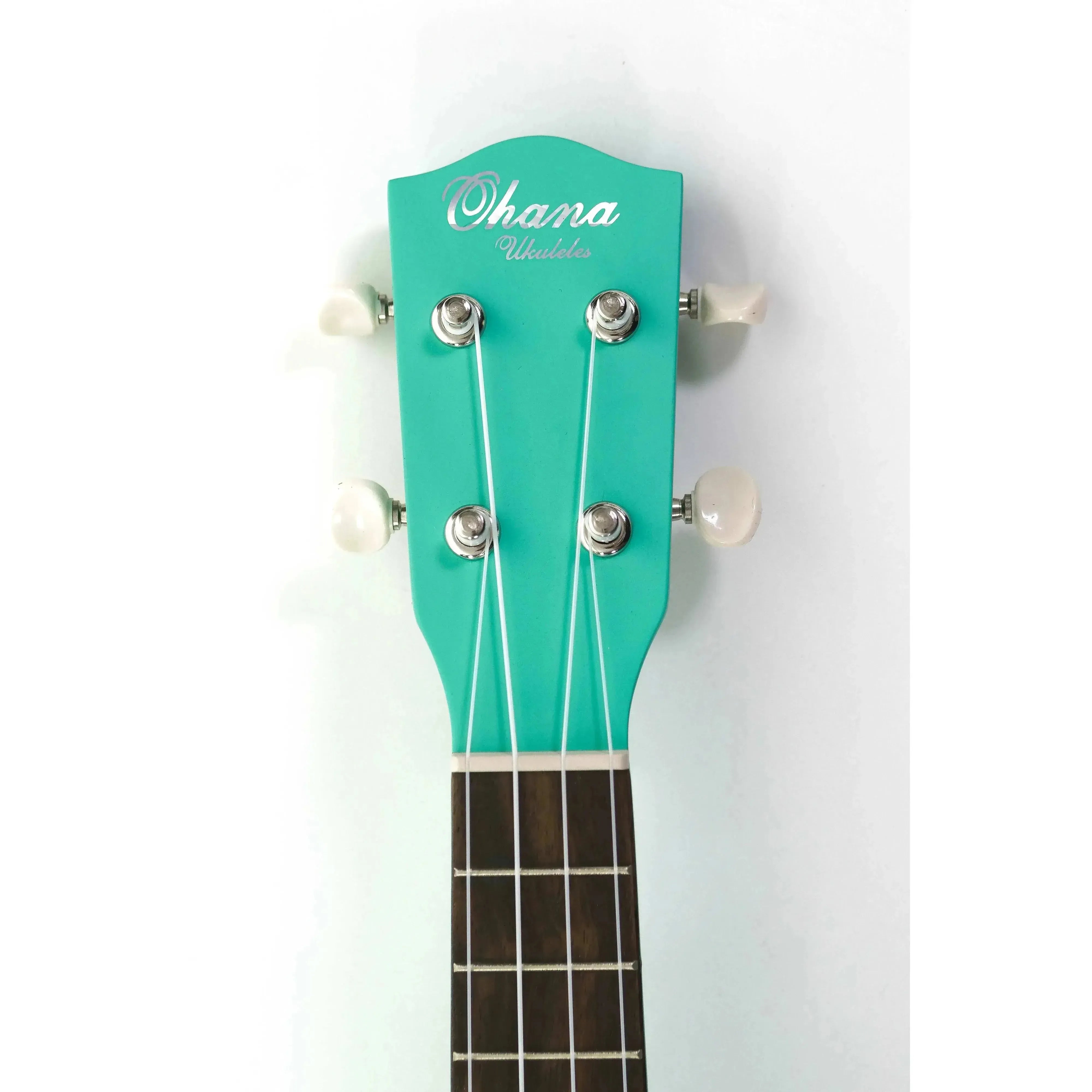 Ohana SK-10-TQ turquoise mahogany soprano ukulele headstock with white tuners.