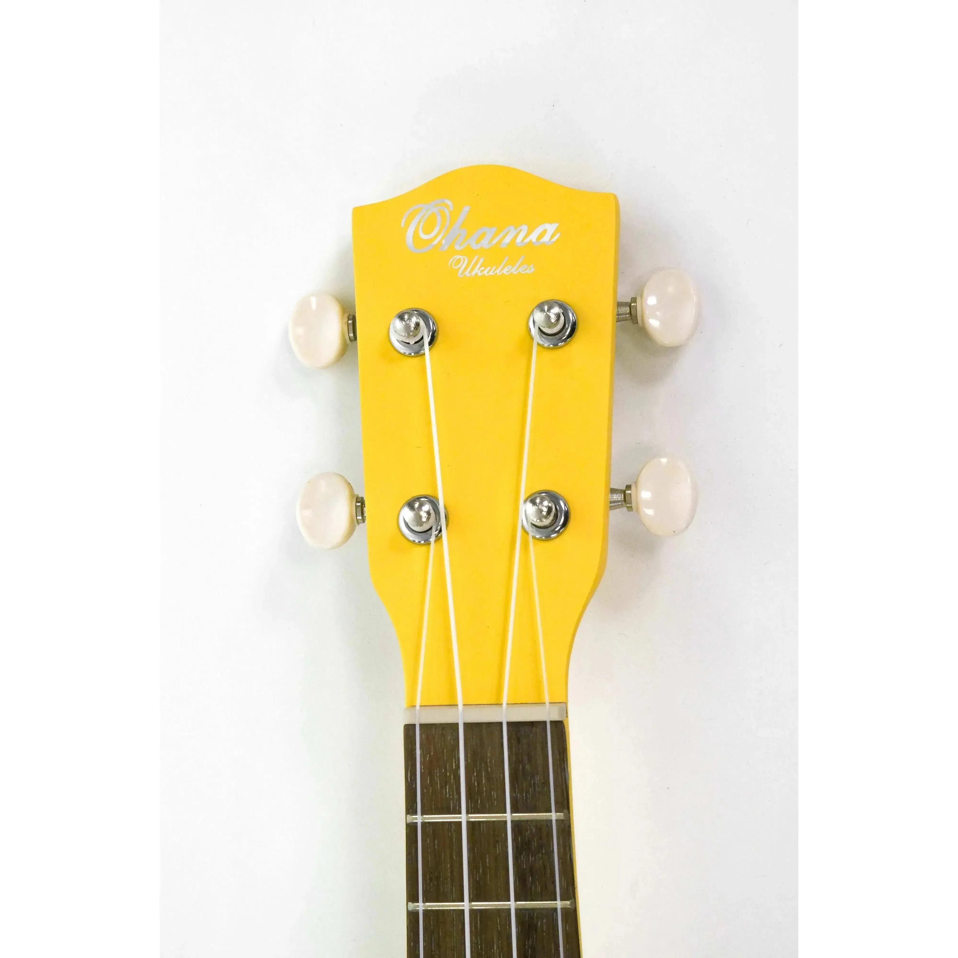 Ohana SK-10-YL yellow mahogany soprano ukulele headstock with white tuners and logo.