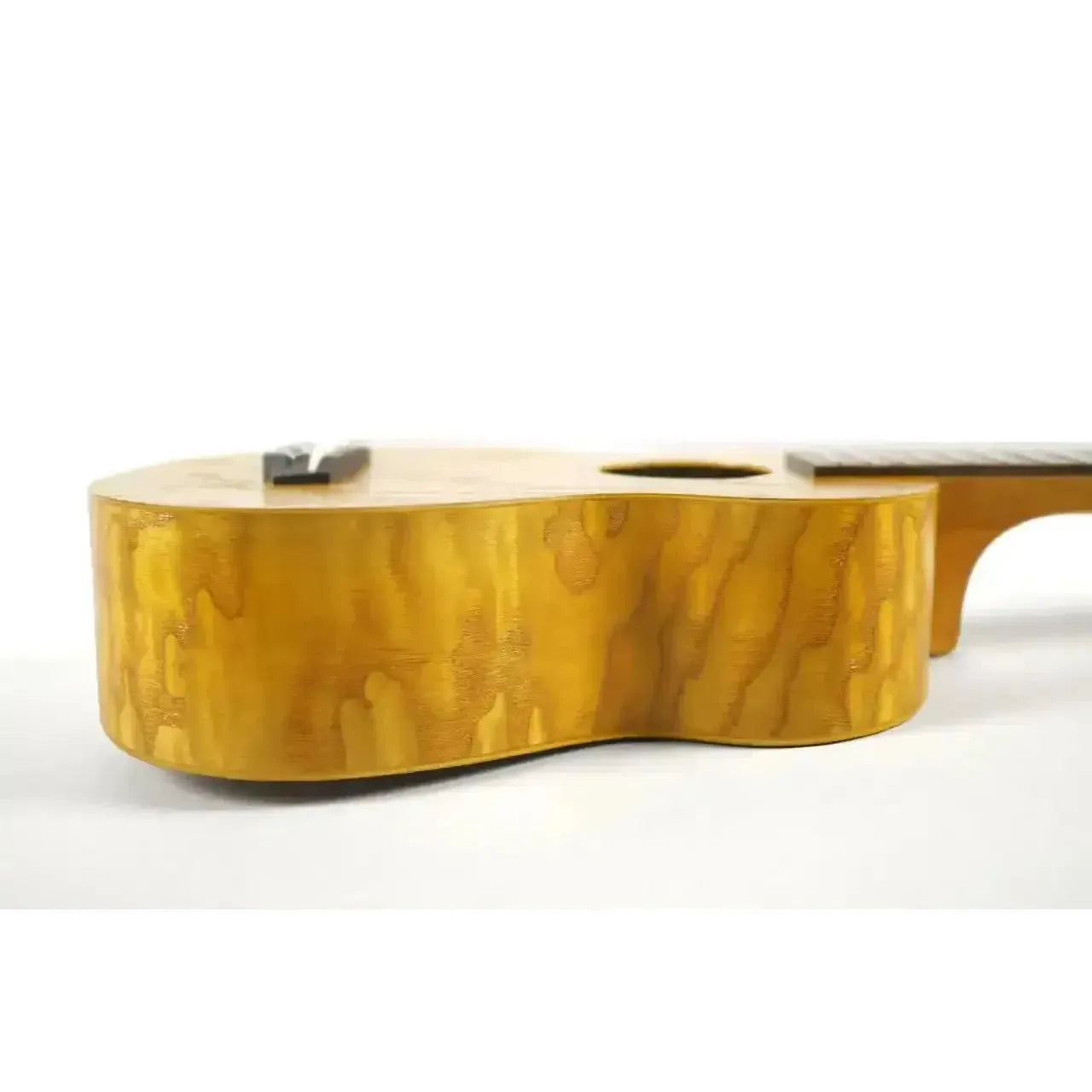 Ohana SK-15W Willow Soprano Ukulele, showing its light brown willow wood body with natural grain.