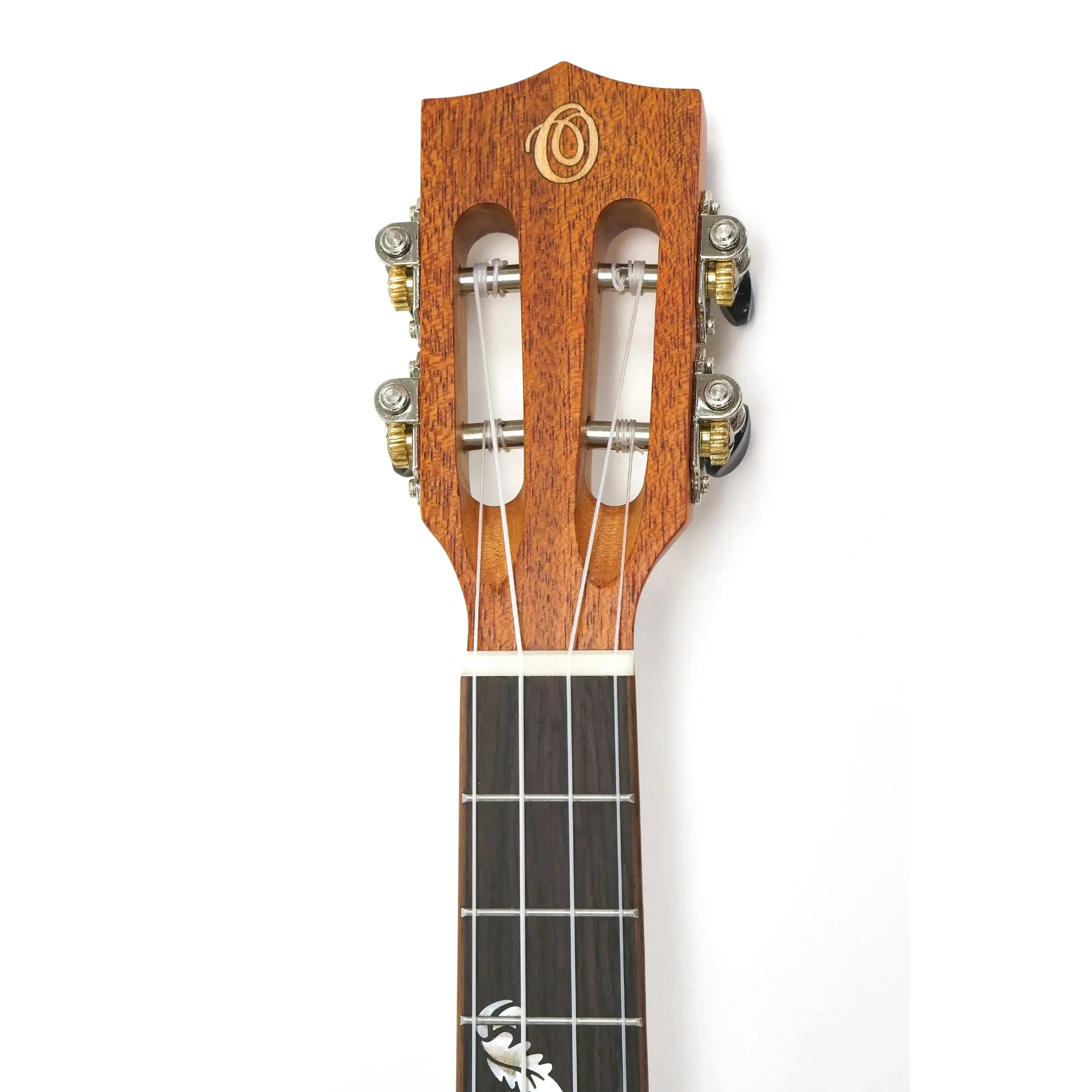 Ohana TK-32 tenor ukulele headstock and fretboard, solid mahogany with slotted design and floral inlay.