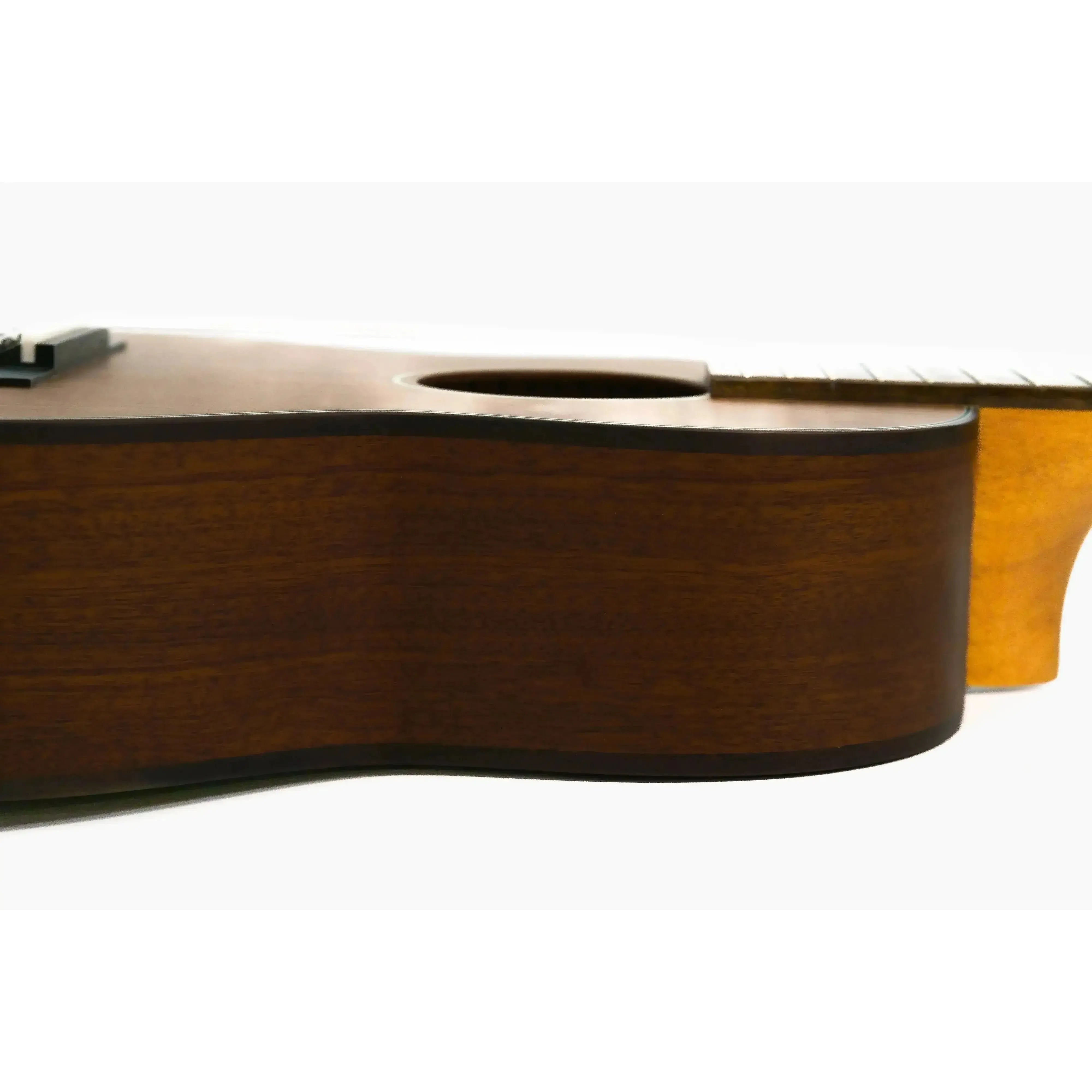 Ohana TK-35 Tenor Ukulele side view, showcasing its solid mahogany body with satin finish.