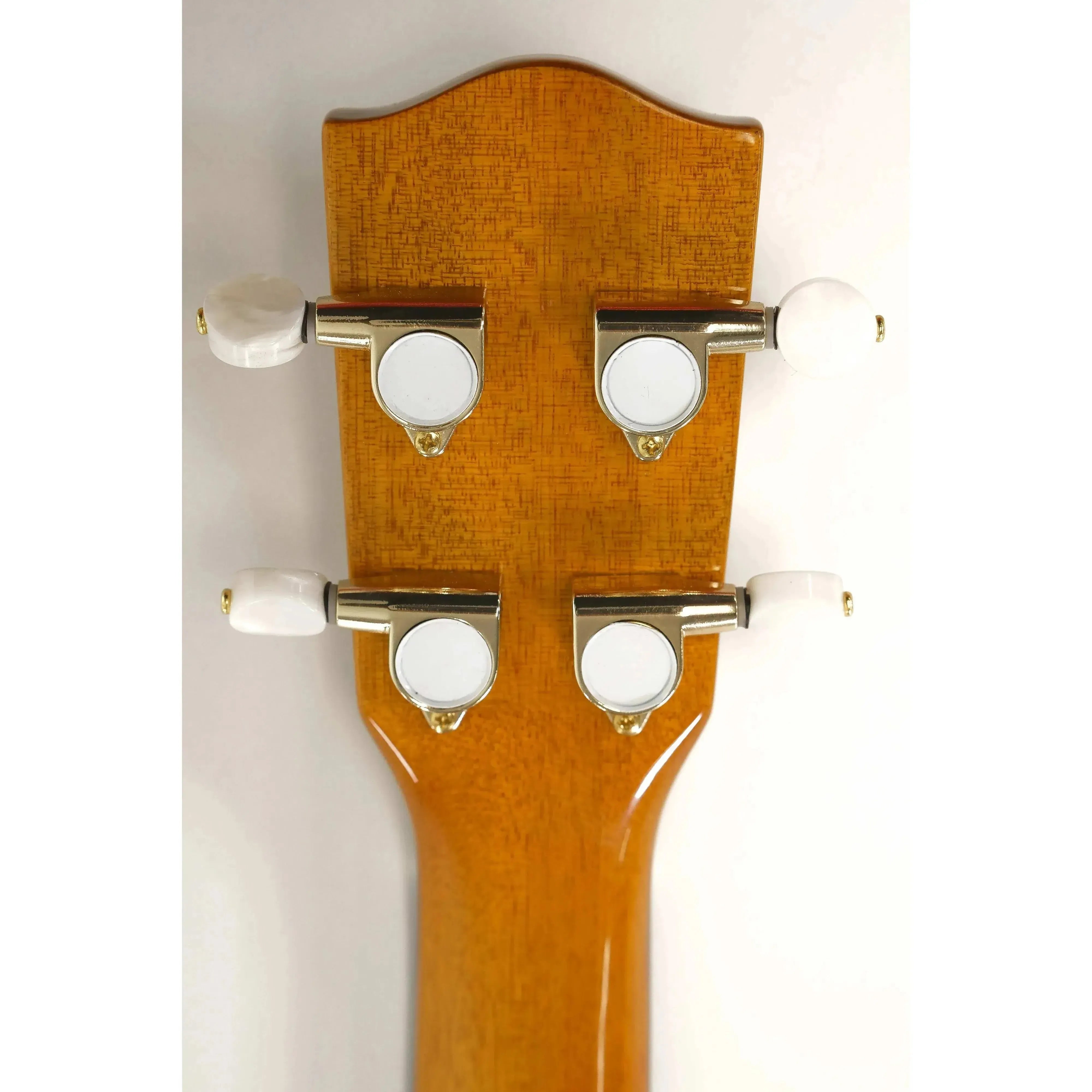 Back of Ohana TK-350G tenor ukulele headstock with gloss Hawaiian Koa wood and four white Grover geared tuners.
