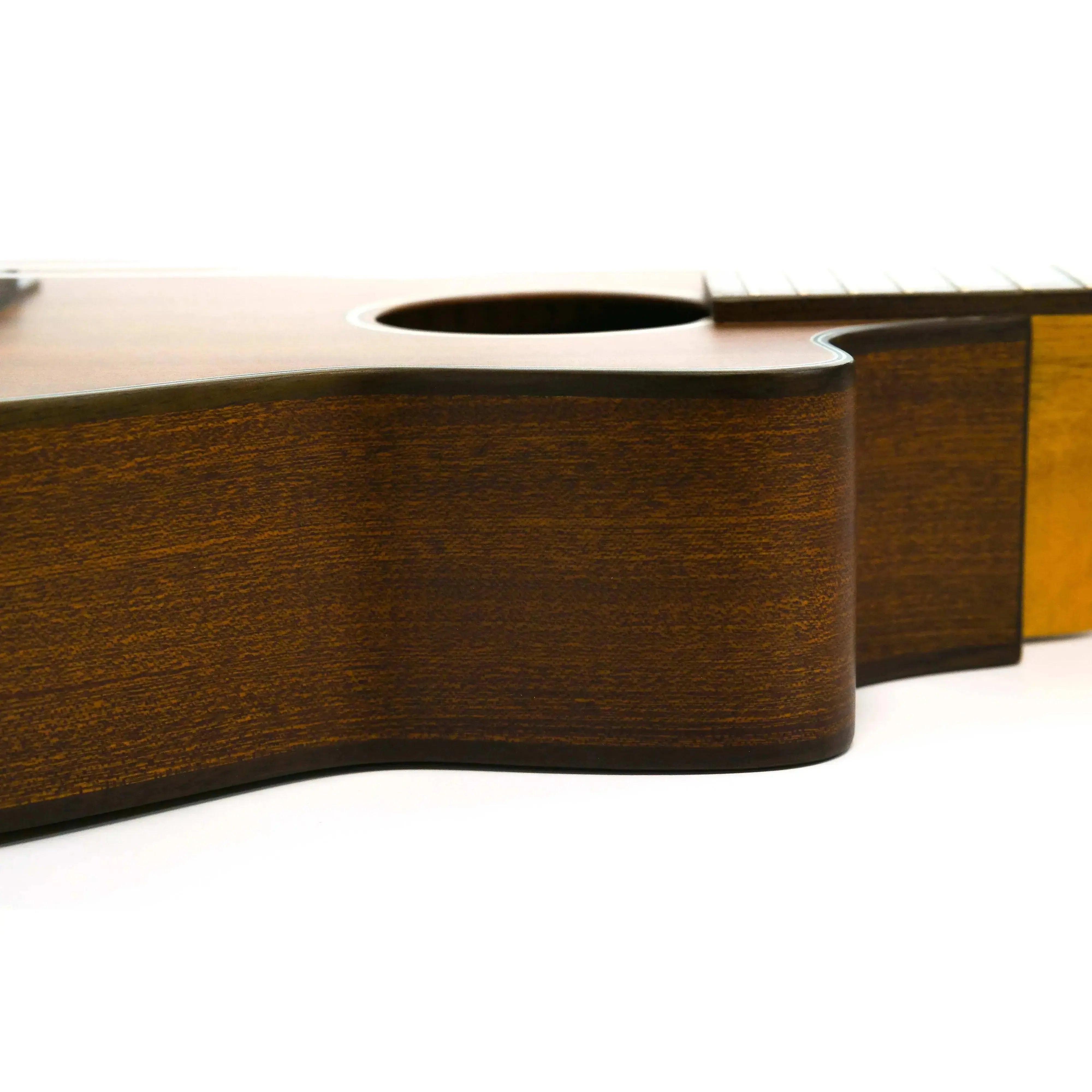 Ohana TK-35CE Tenor Ukulele, close-up of solid mahogany body with satin finish and cutaway.