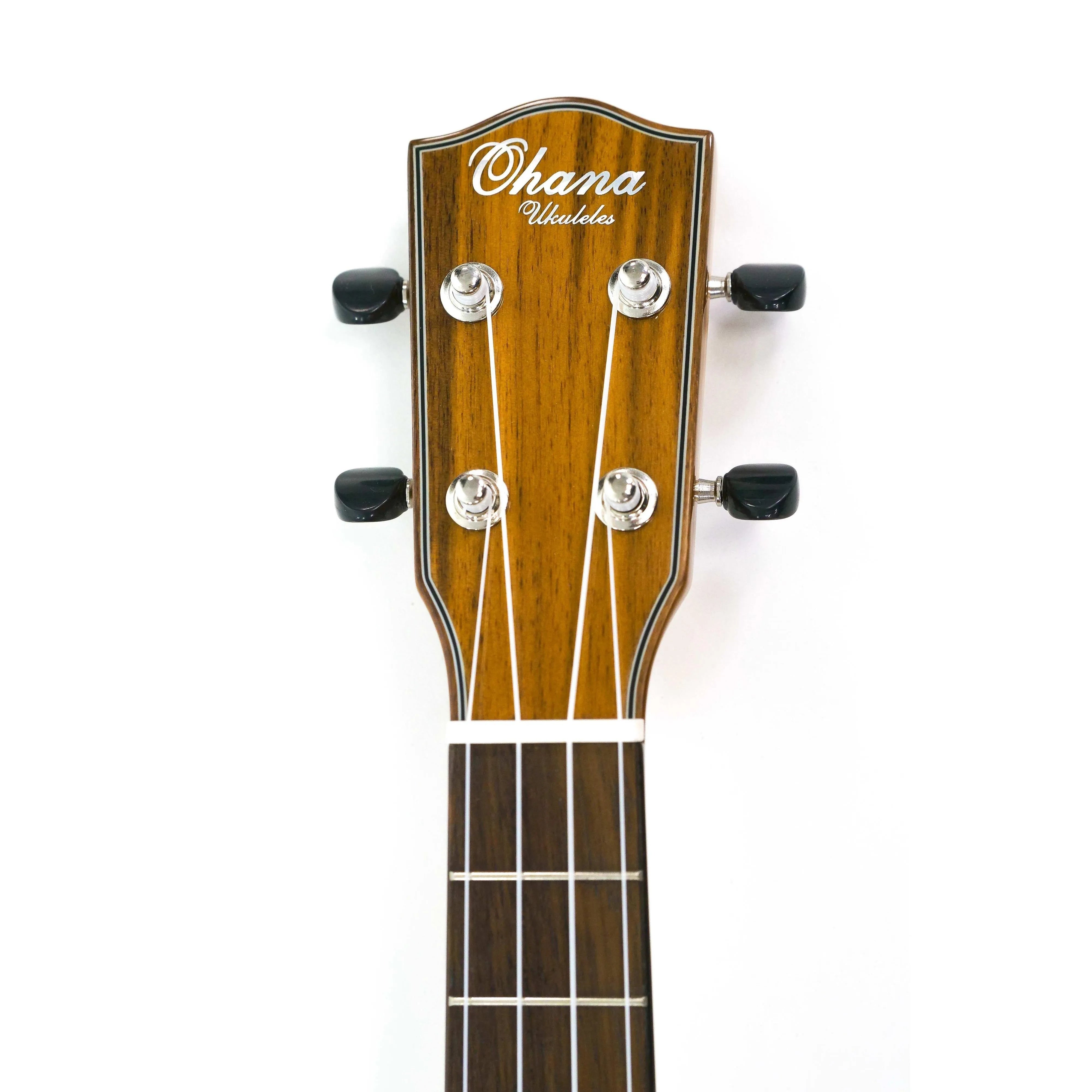 Ohana TK-35GCE-LH tenor ukulele headstock with glossy mahogany finish, black tuners, and white logo.