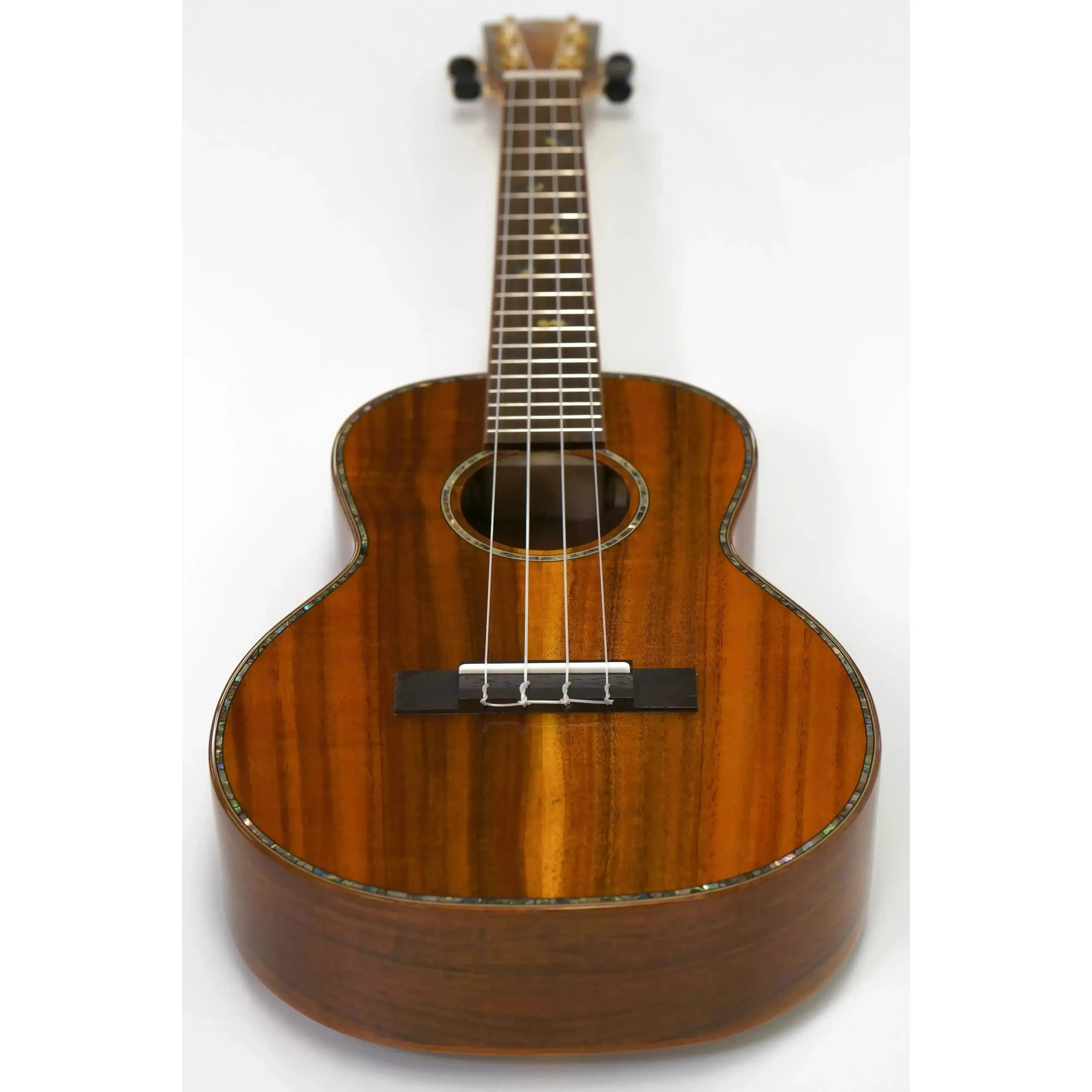 Ohana TK-370G Tenor Ukulele with gloss solid Hawaiian Koa wood, abalone rosette, and dark fretboard.
