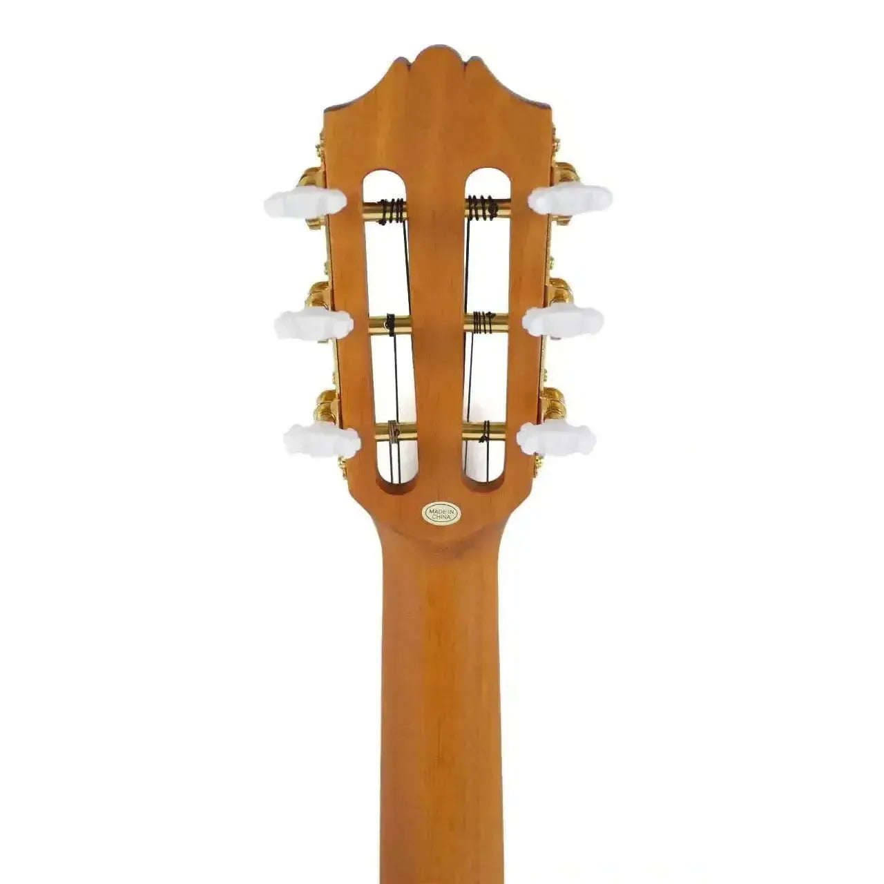 Back of an Ohana TK-70-6 Tenor Ukulele headstock with open slotted design, gold tuners, and white buttons.