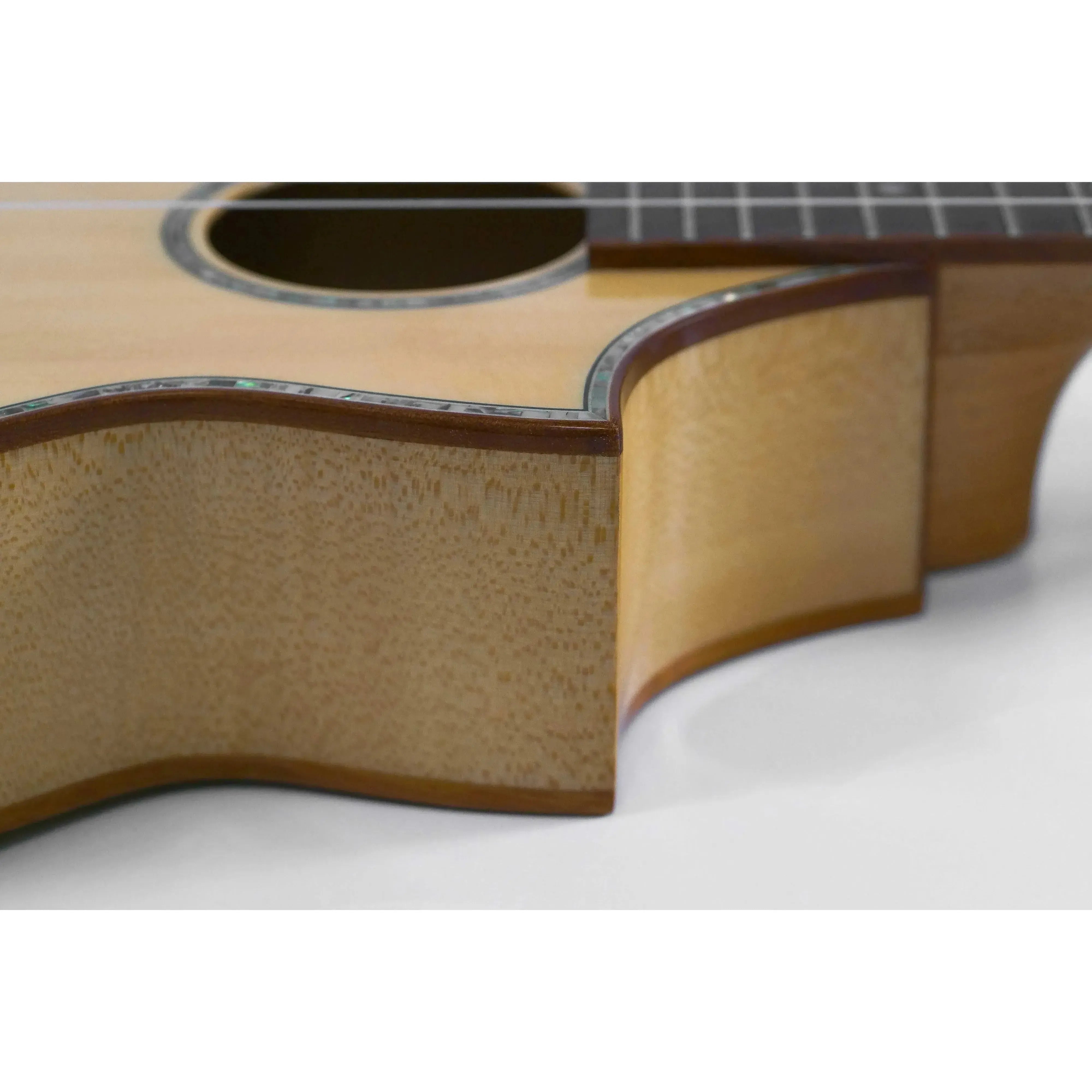 Ohana TK-75CG Tenor Ukulele with solid flamed maple sides, spruce top, abalone inlay, and Florentine cutaway.