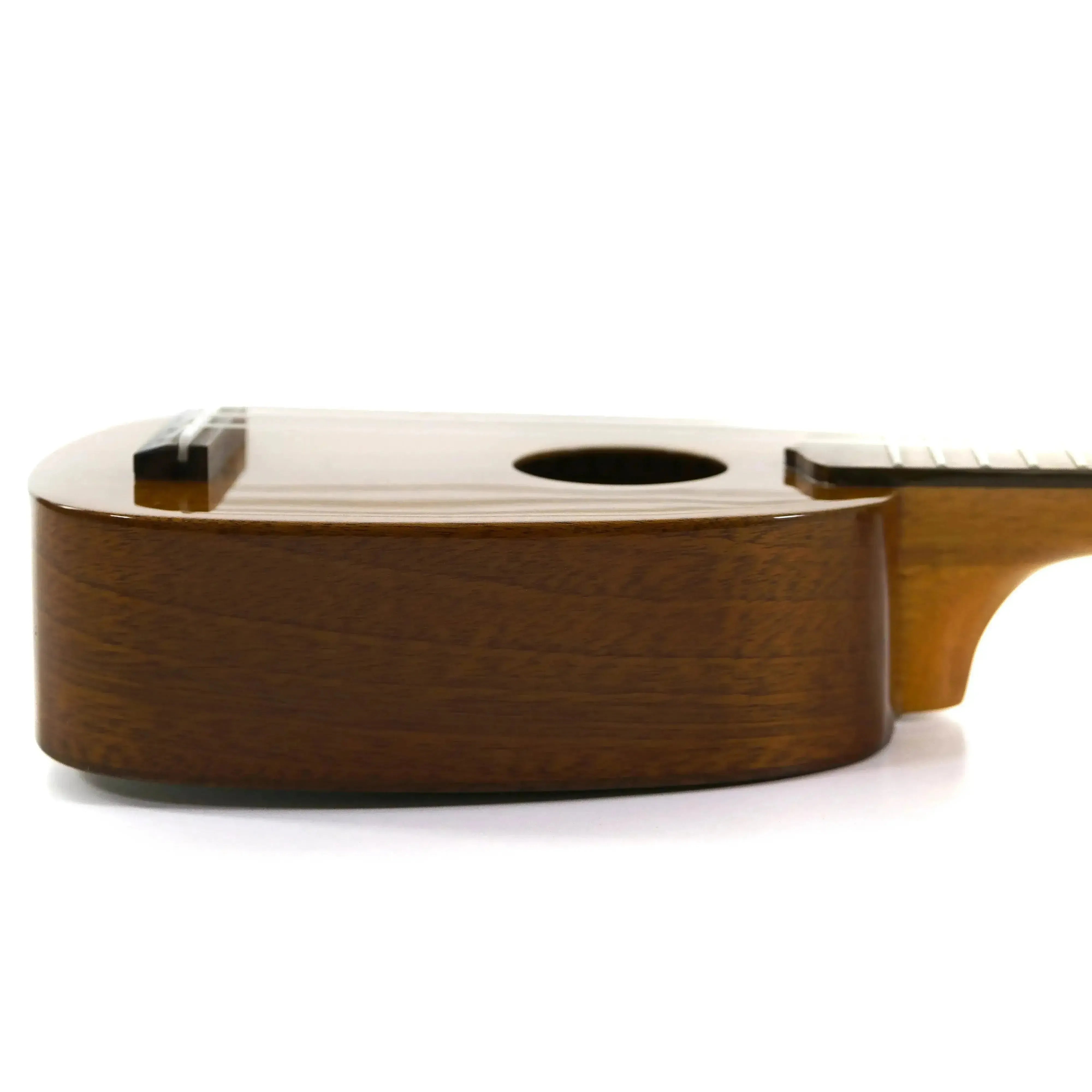 Ohana TTPK-25G solid mahogany pineapple sopranissimo ukulele with glossy finish, soundhole, and bridge.