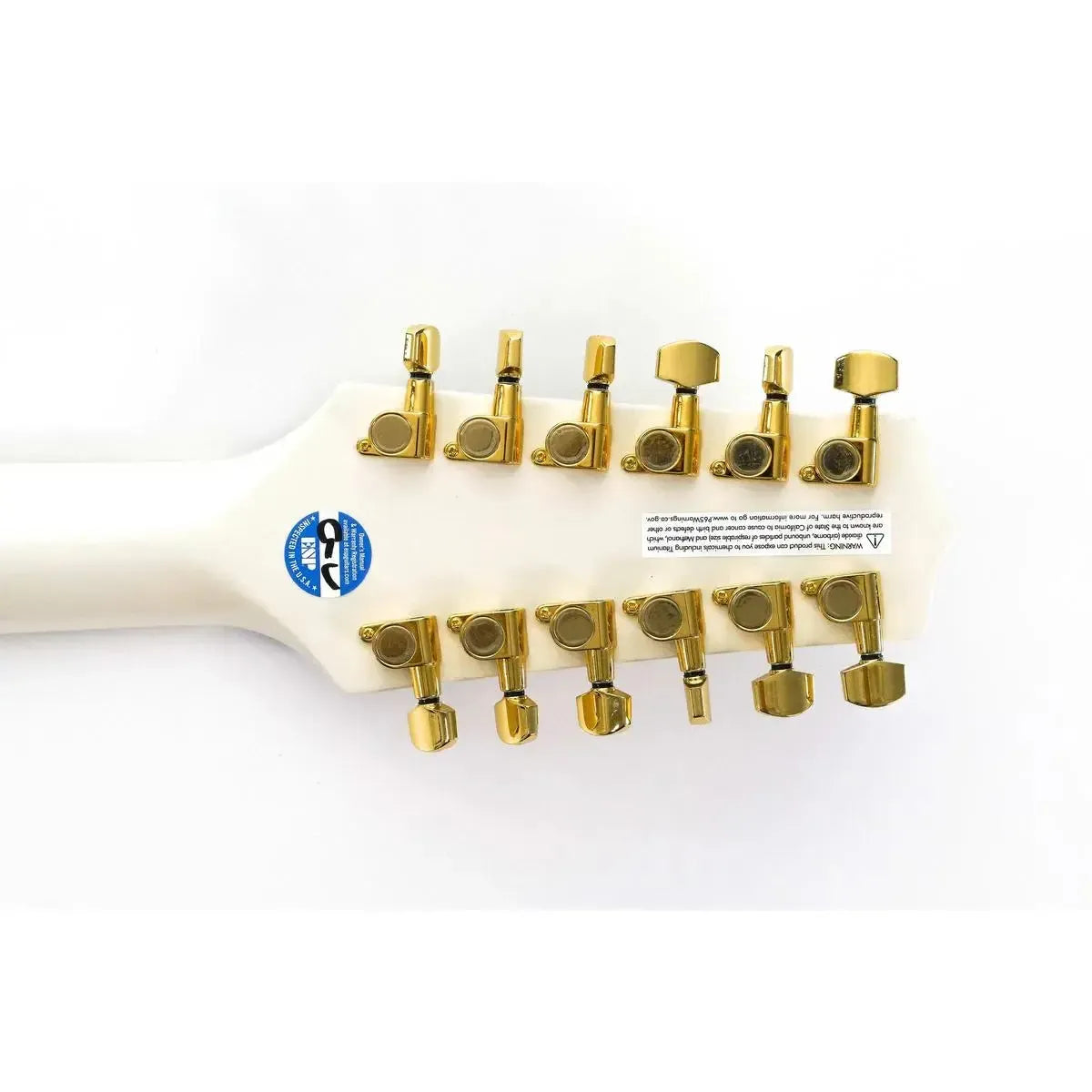 Takamine GD37CE-12 PW 12-string acoustic-electric guitar headstock with gold tuners and pearl white finish.