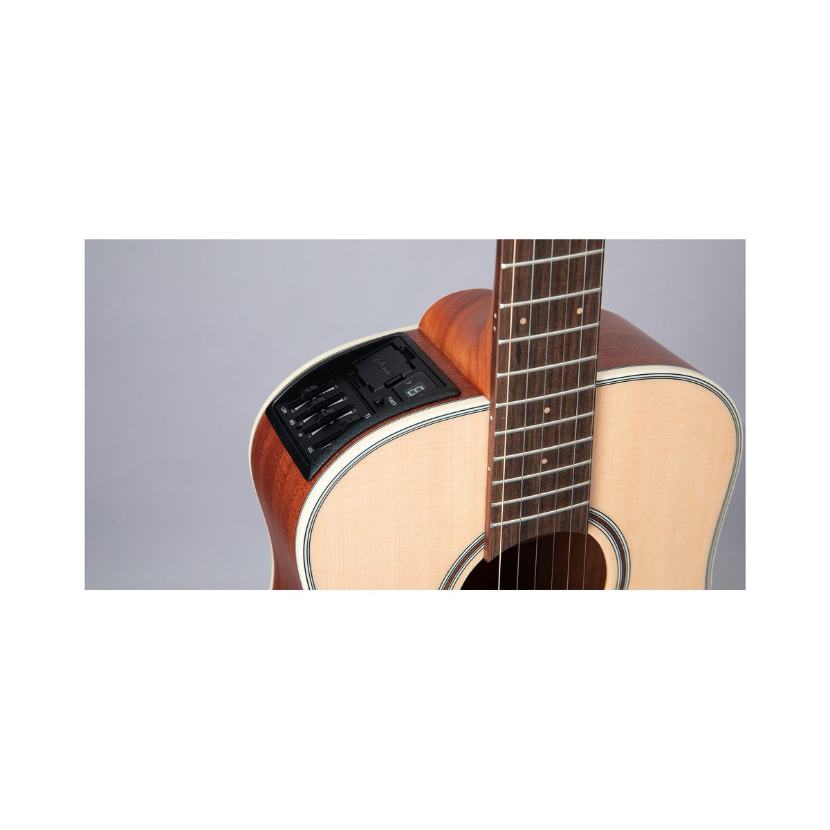 Close-up of the Takamine TP-3G preamp on the upper bout of the GP3HSE dreadnought, beside the fingerboard and soundhole.