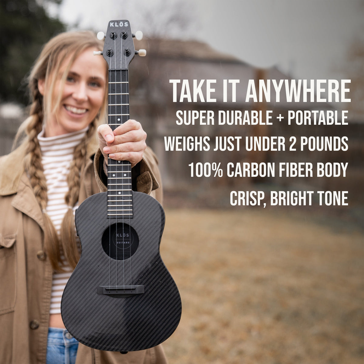 Player holding the Klōs Full Carbon concert ukulele outdoors with feature callouts