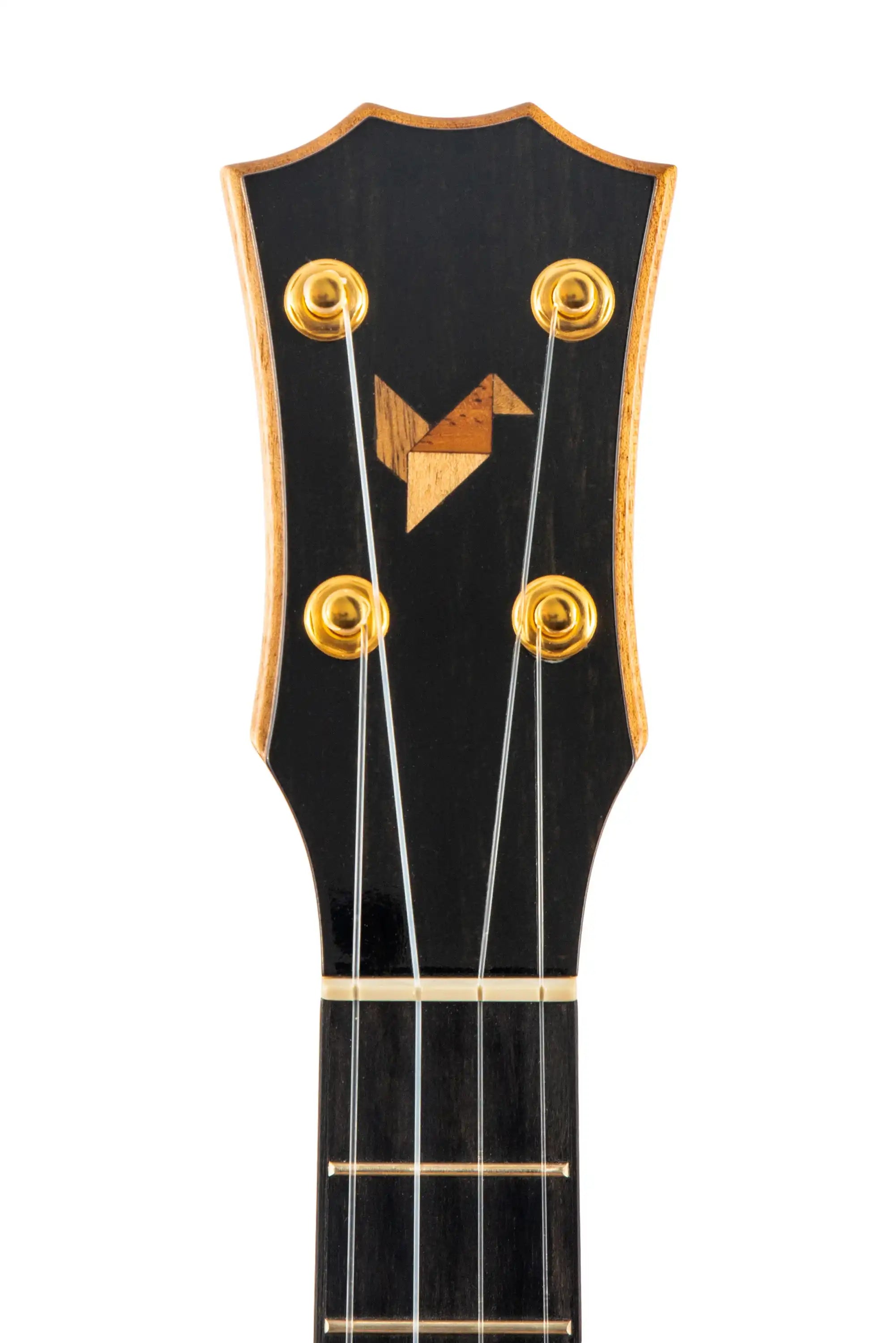 Ukulele headstock with gold tuners and wood inlay, black finish, at Terry Carter Music Store.