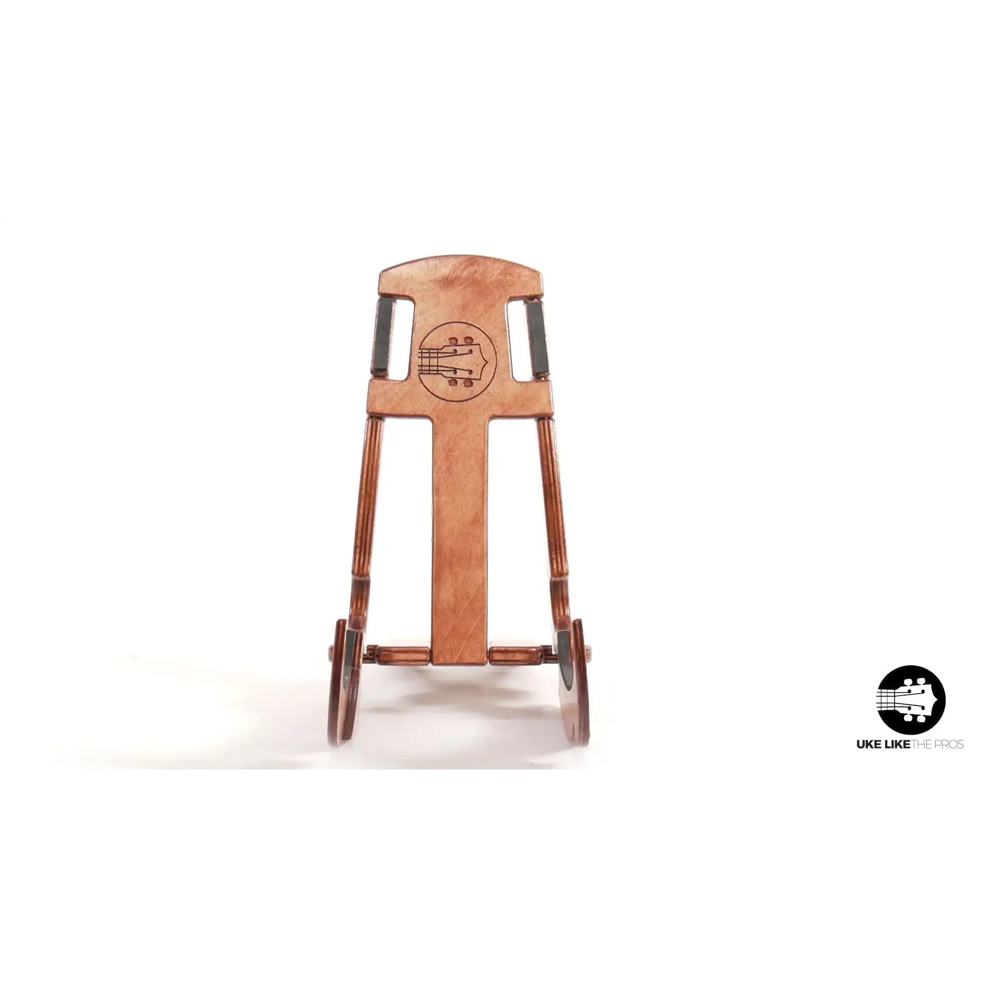 Wooden K-Stands Maui Hook ukulele stand on white background at Terry Carter Music Store.