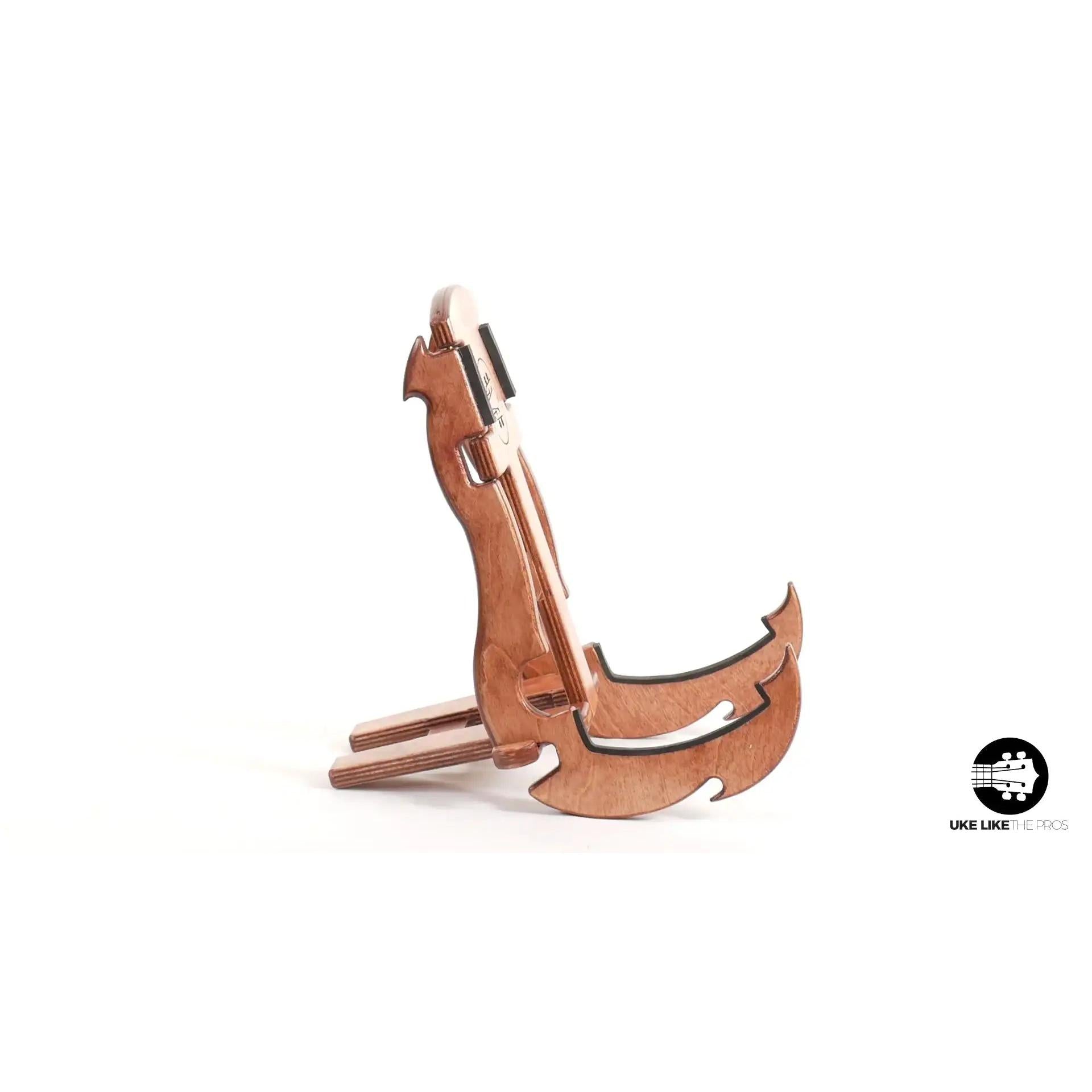 Wooden tenor ukulele stand with hook design, side view, at Terry Carter Music Store.