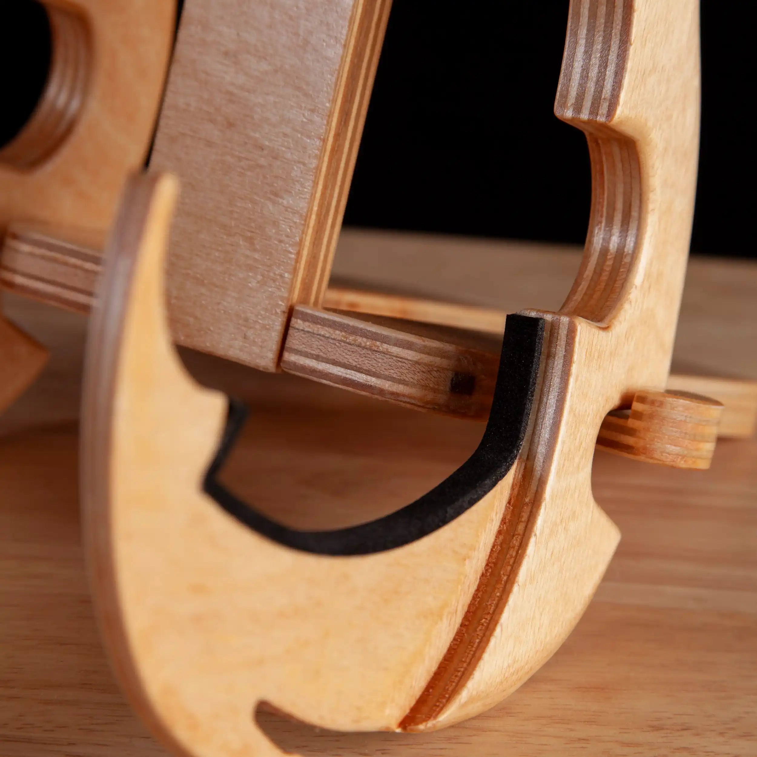 Wood instrument stand close-up, natural finish, Terry Carter Music Store accessory