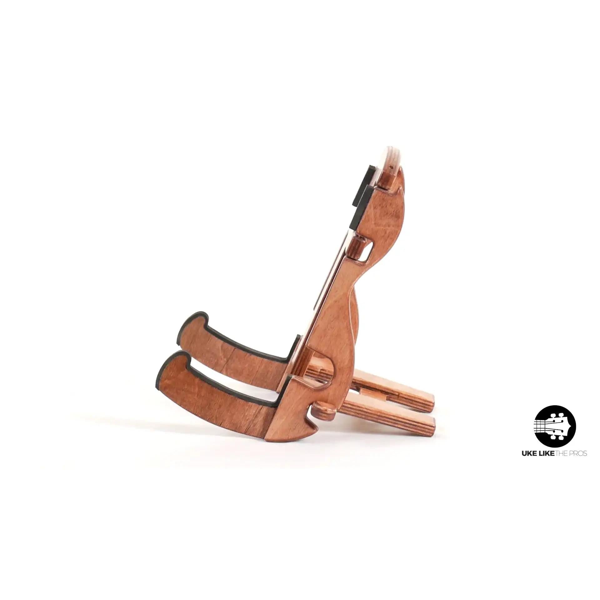 Wooden soprano concert ukulele stand with padded arms on white background at Terry Carter Music Store