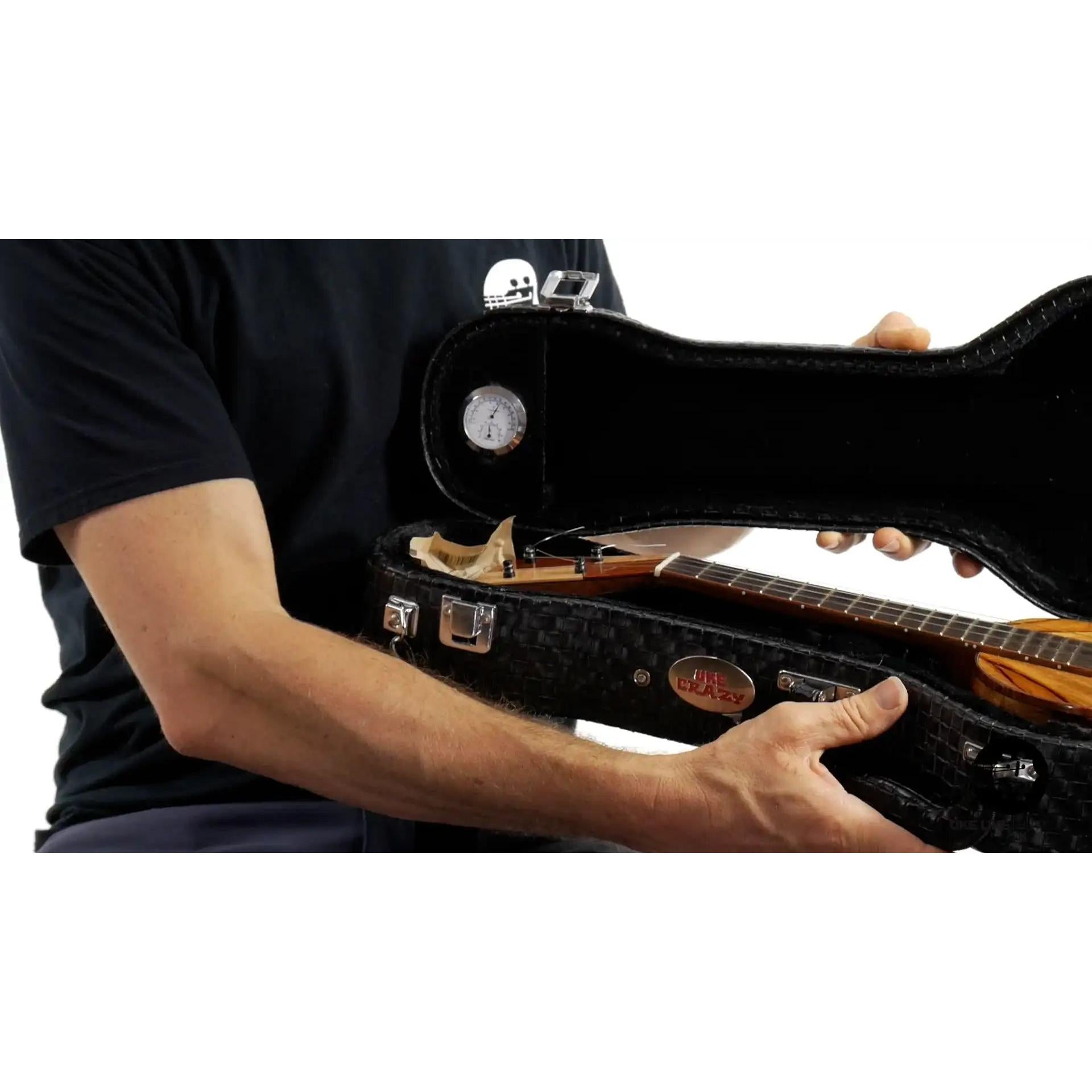 Mya-Moe ukulele with chocolate heart wood case at Terry Carter Music Store