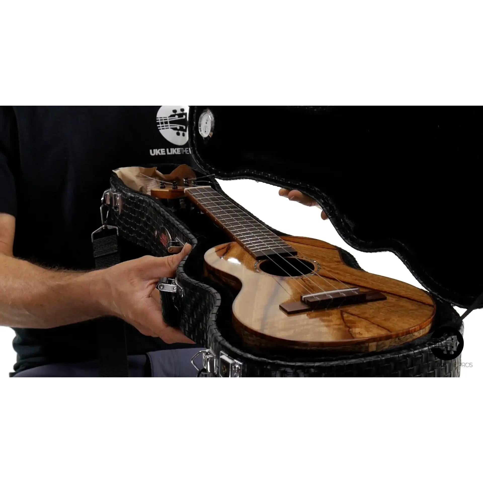 Mya Moe Chocolate Heart ukulele with figured wood in hard case at Terry Carter Music Store