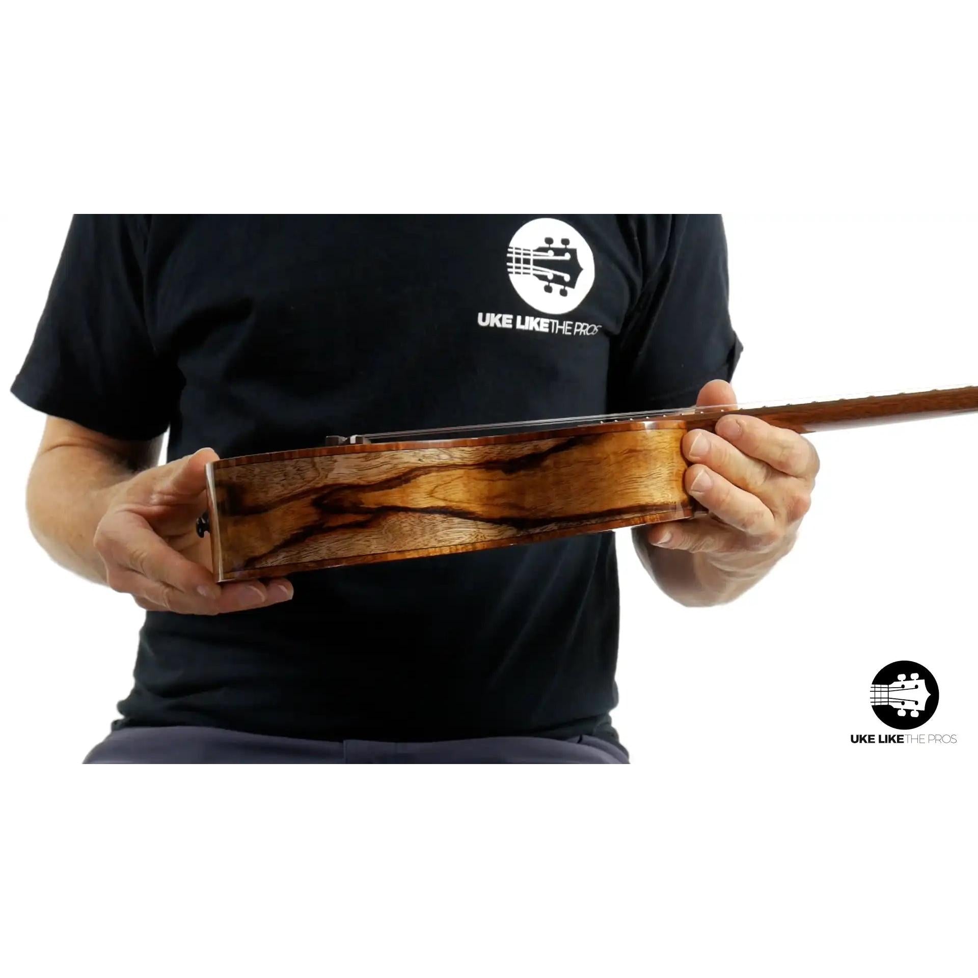 Mya-Moe ukulele side view with striking chocolate heart wood grain, Terry Carter Music Store