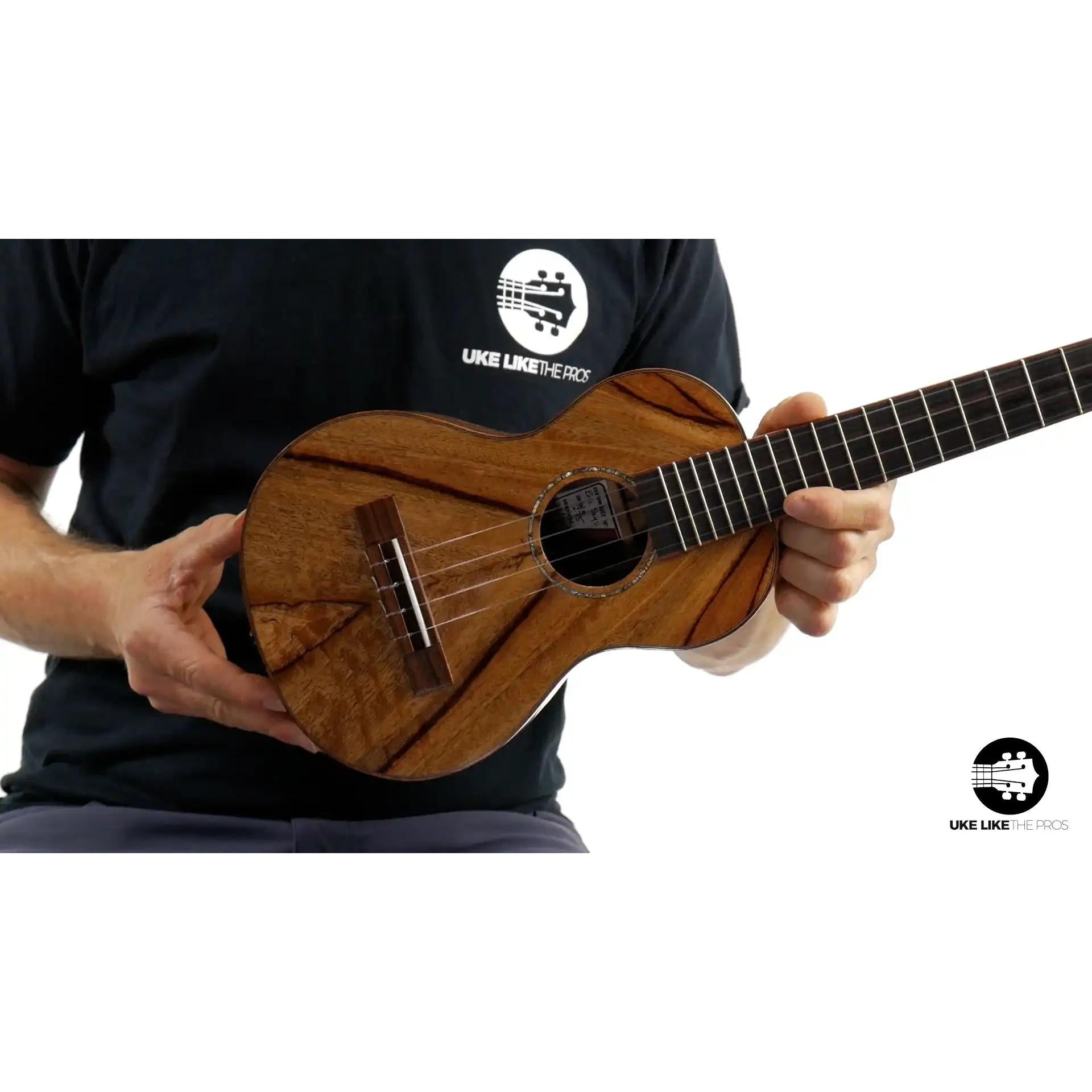 Mya-Moe Chocolate Heart ukulele with striking wood grain top at Terry Carter Music Store