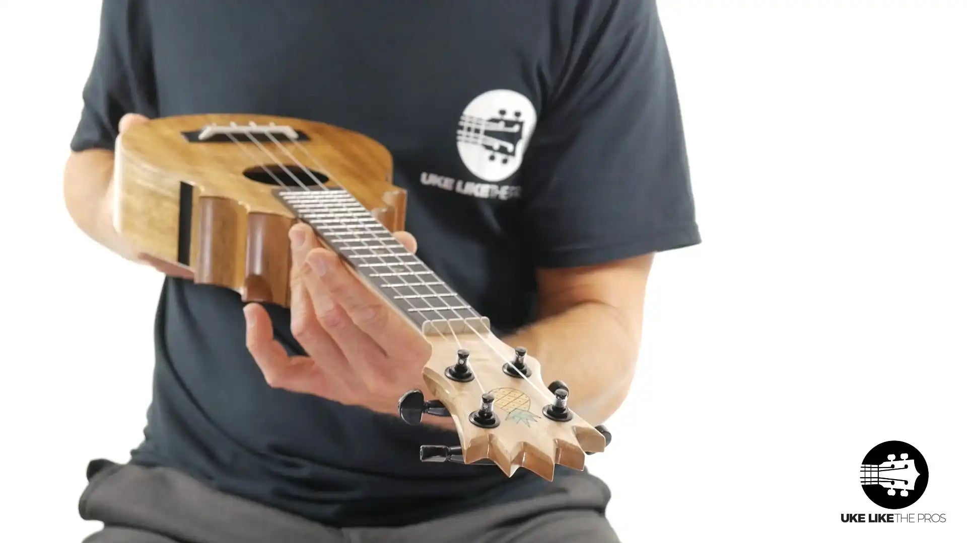 Pono mahogany ukulele with unique headstock, displayed at Terry Carter Music Store