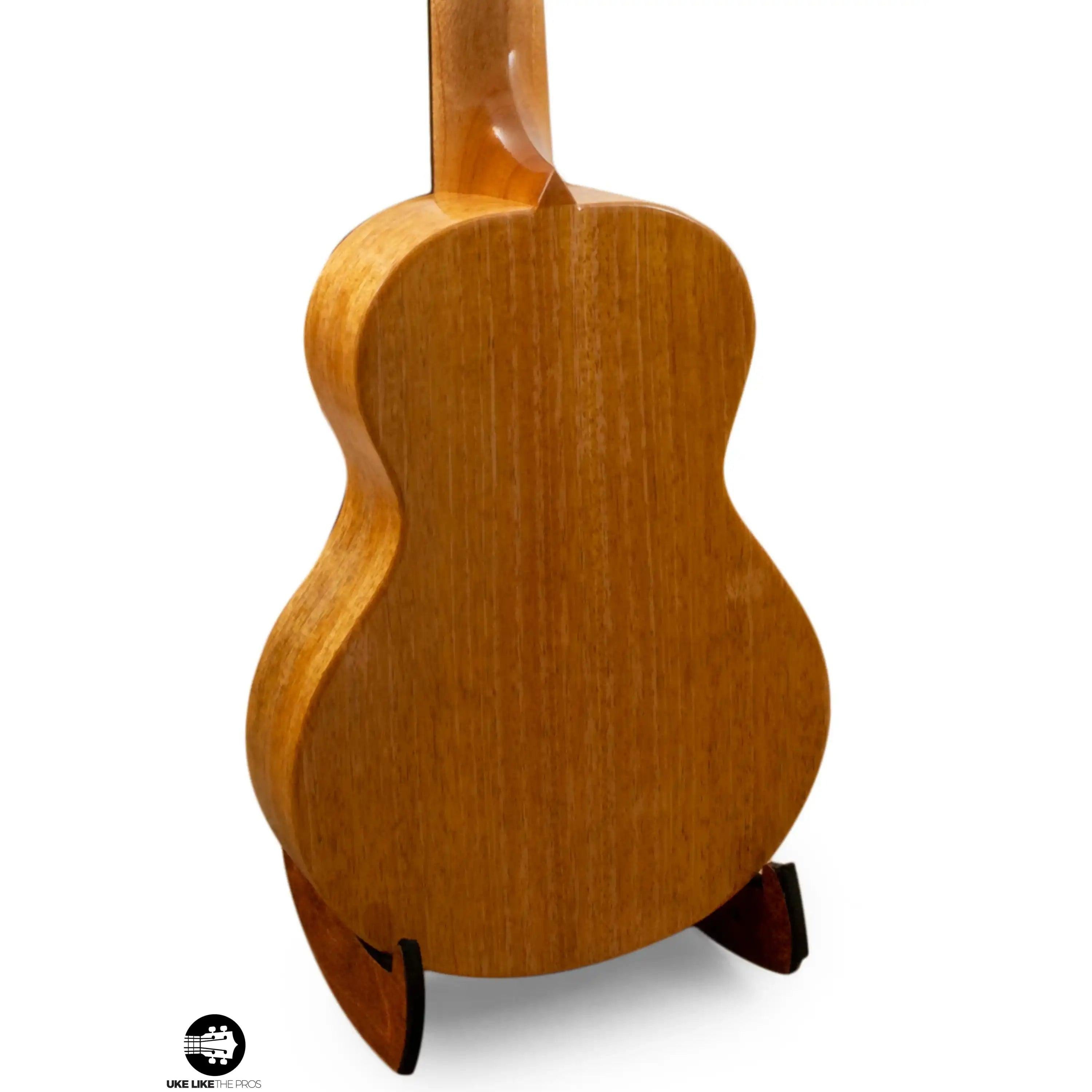 Romero Creations ukulele mahogany back on stand at Terry Carter Music Store