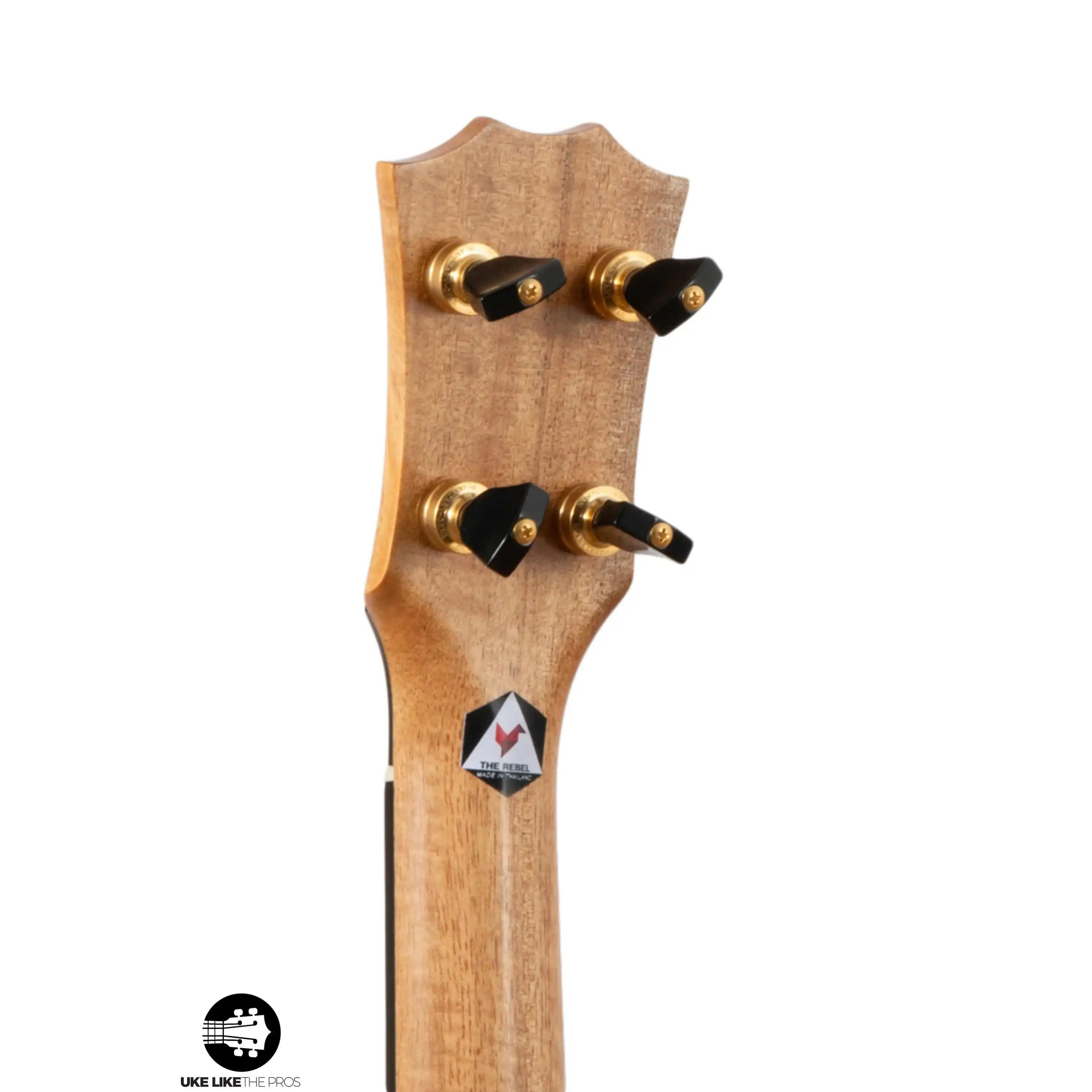 The Rebel ukulele headstock with gold tuners, natural wood finish at Terry Carter Music Store