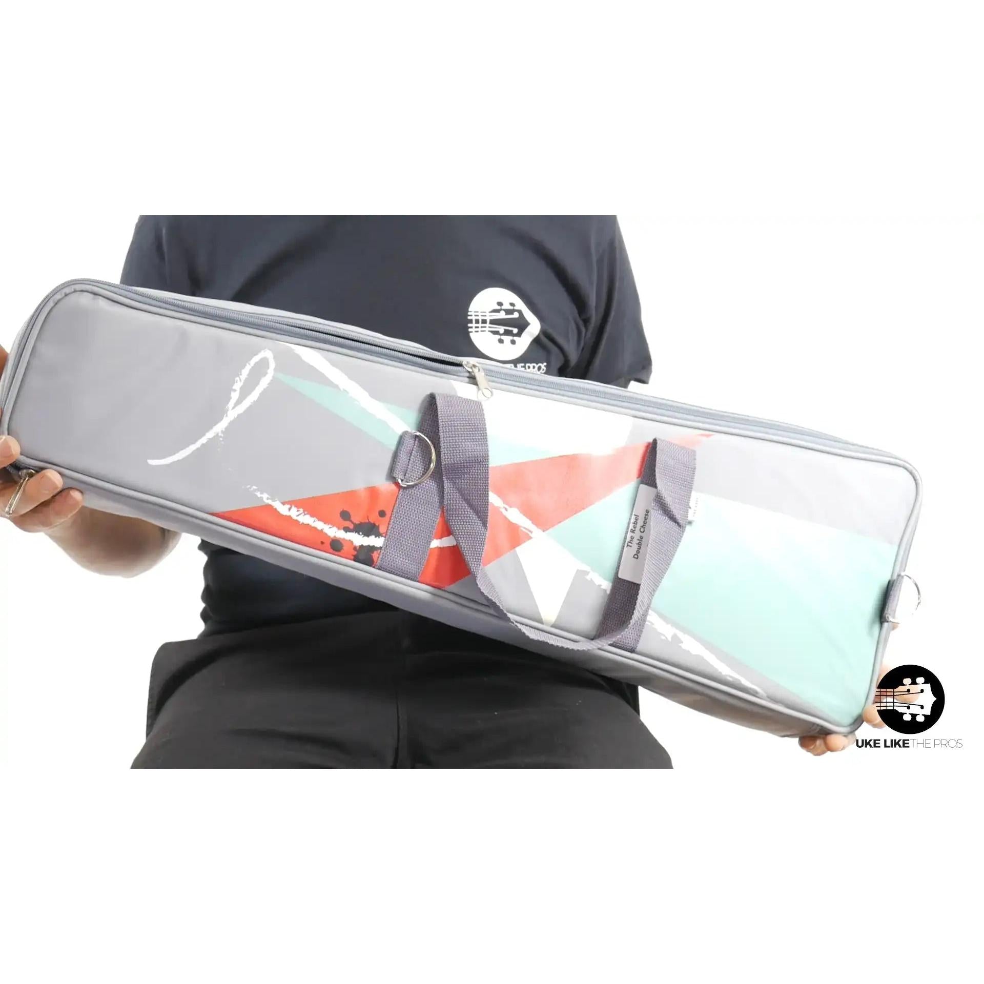 Rebel Double Gig Case with abstract design, gray straps, at Terry Carter Music Store
