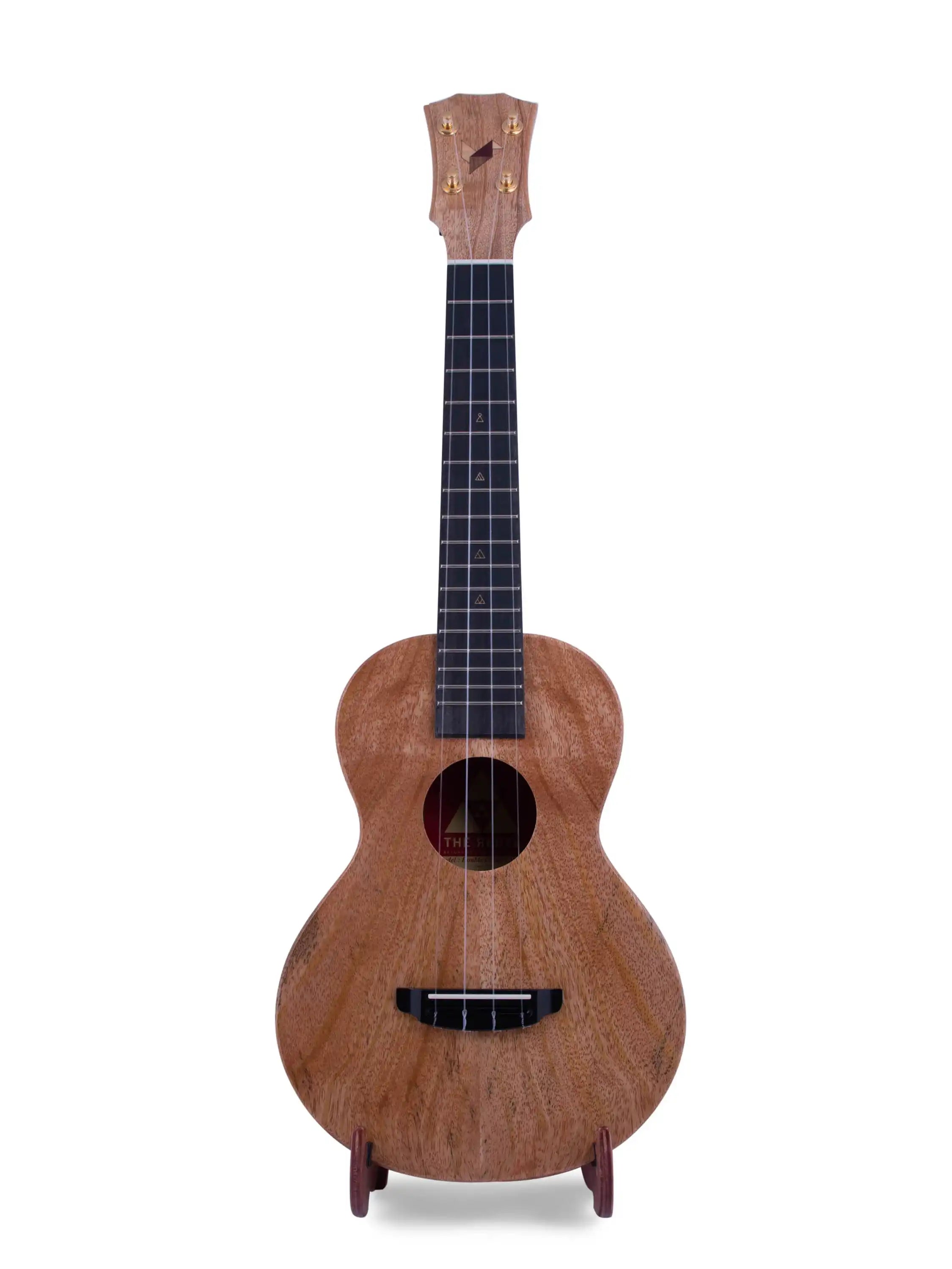 Rebel ukulele with natural wood finish on stand, concert size, at Terry Carter Music Store