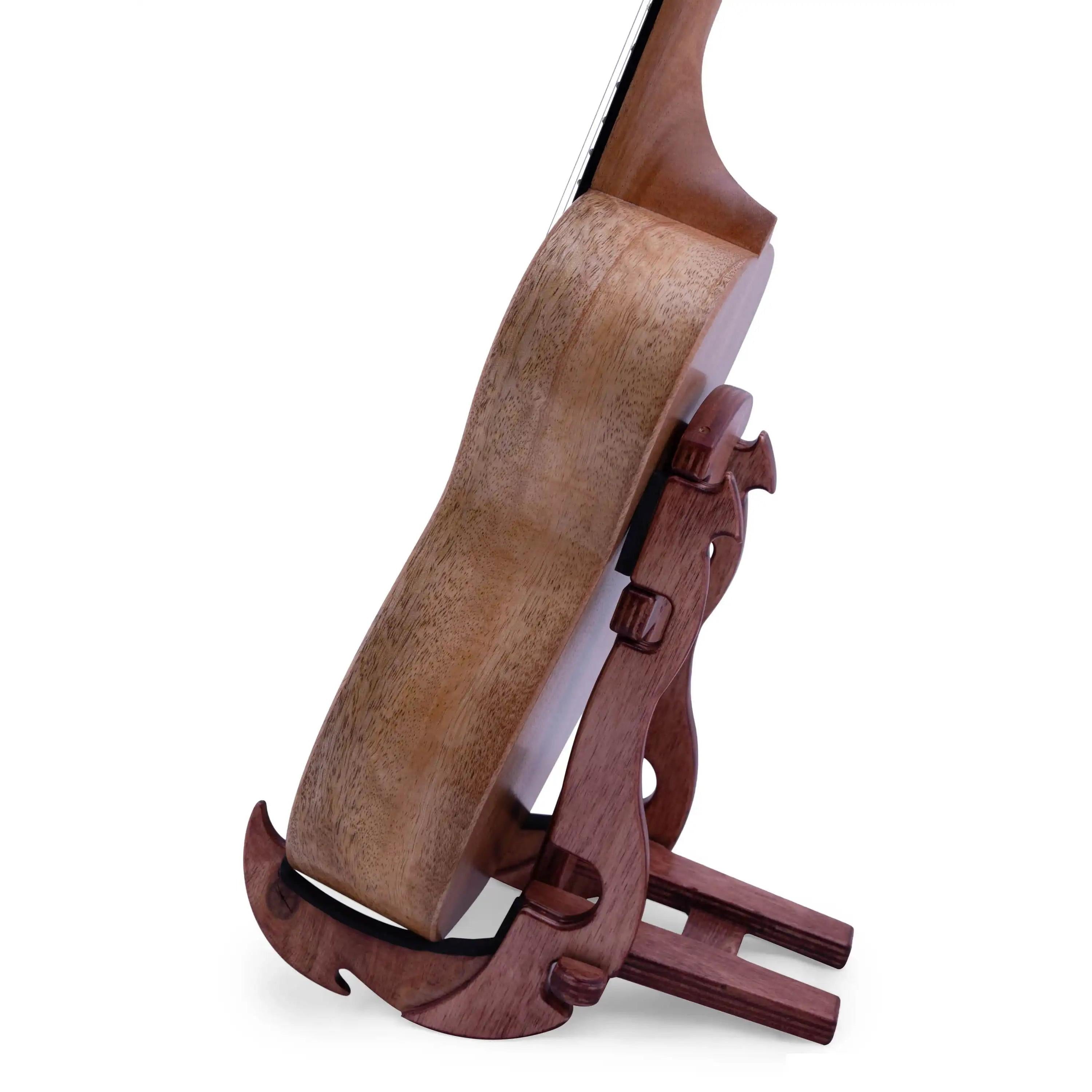 Side view of mahogany ukulele body on wooden stand at Terry Carter Music Store