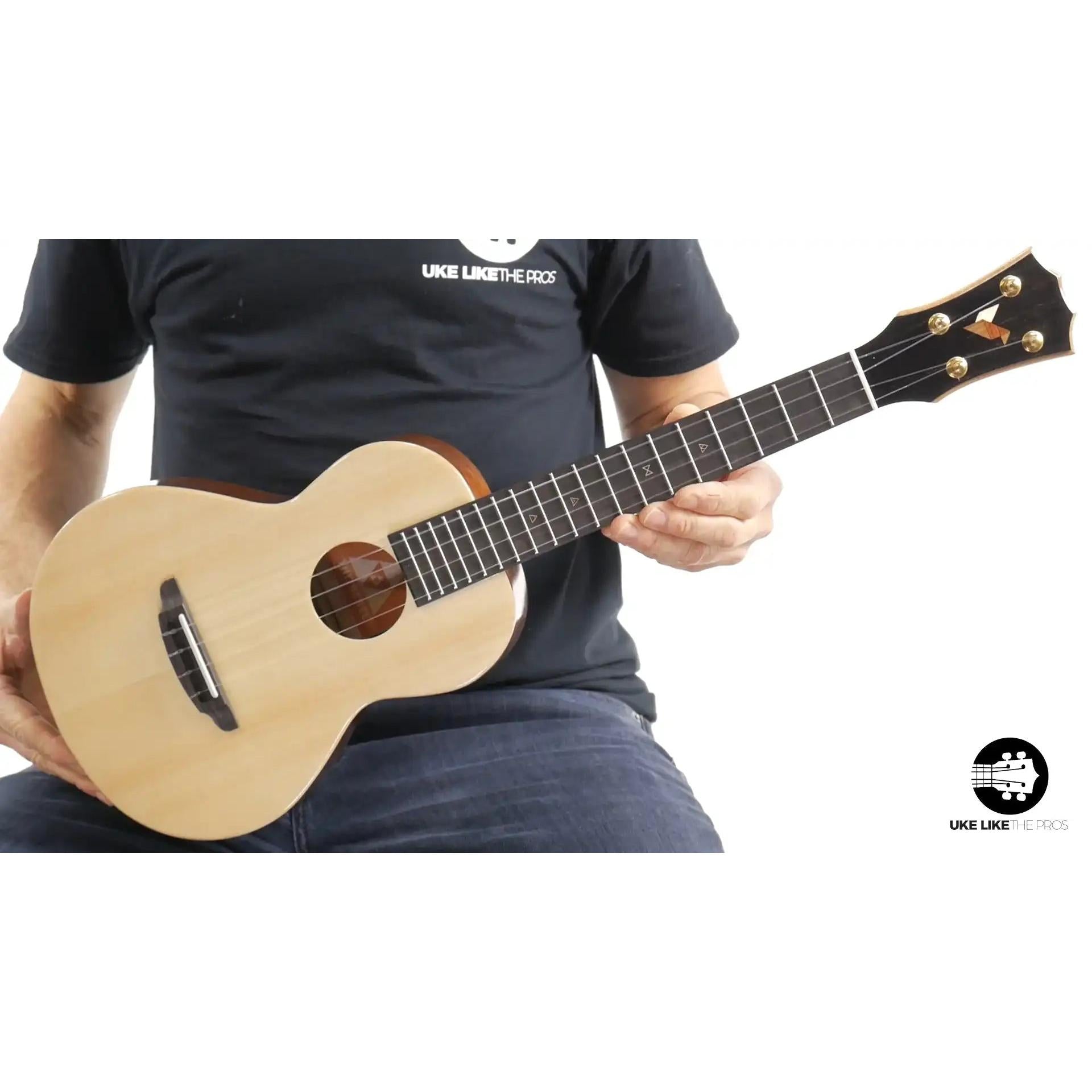 Rebel Double Cheese ukulele with light wood top, shown at Terry Carter Music Store