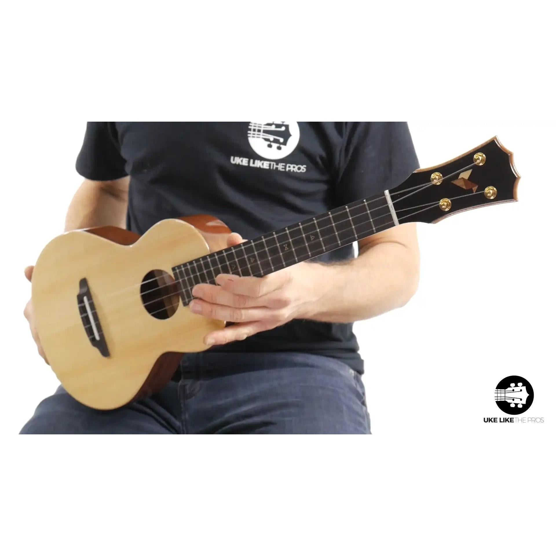 Rebel Double Cheese Spitfire ukulele with light spruce top and dark wood sides, Terry Carter Music Store