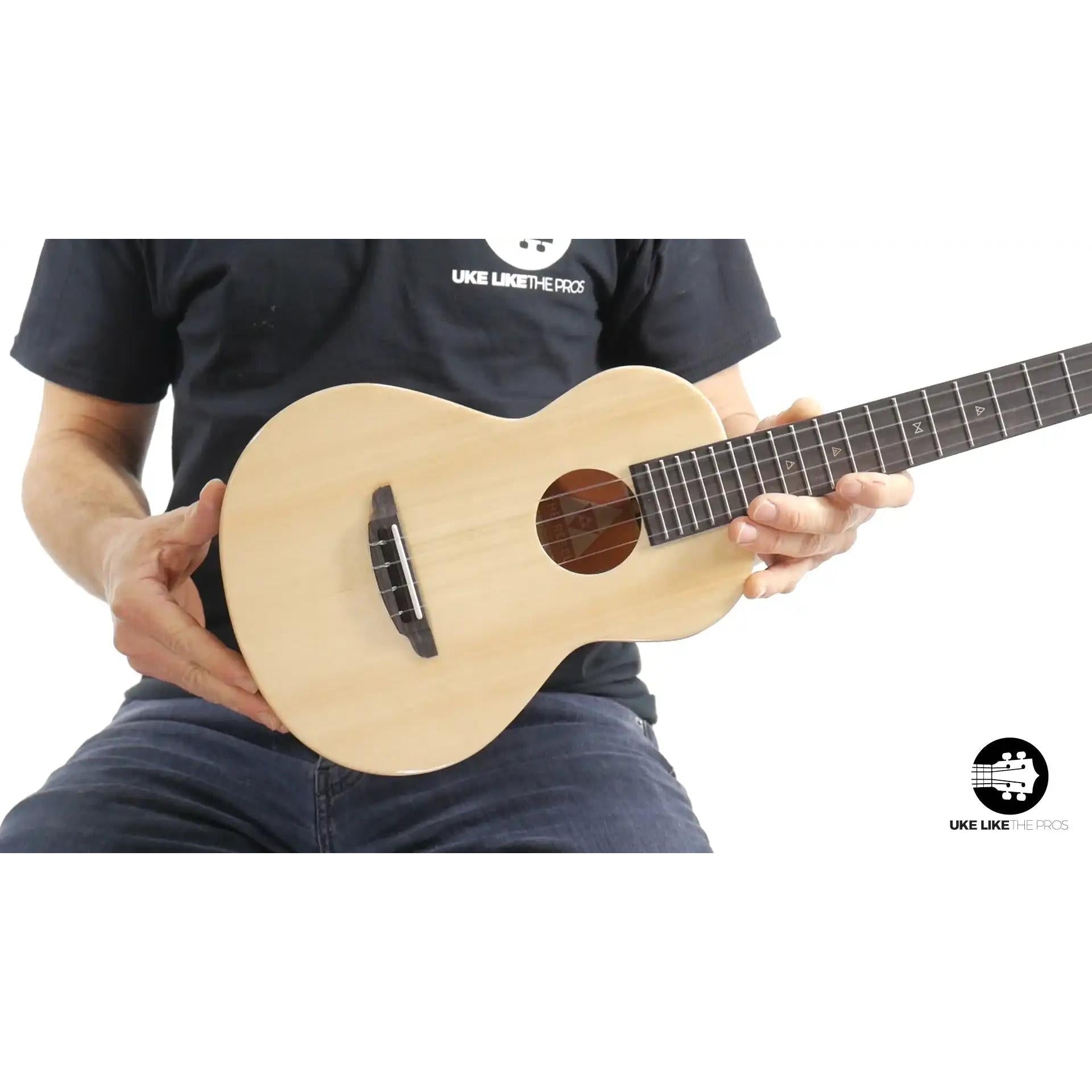Rebel Double Cheese Spitfire ukulele with light wood top at Terry Carter Music Store.