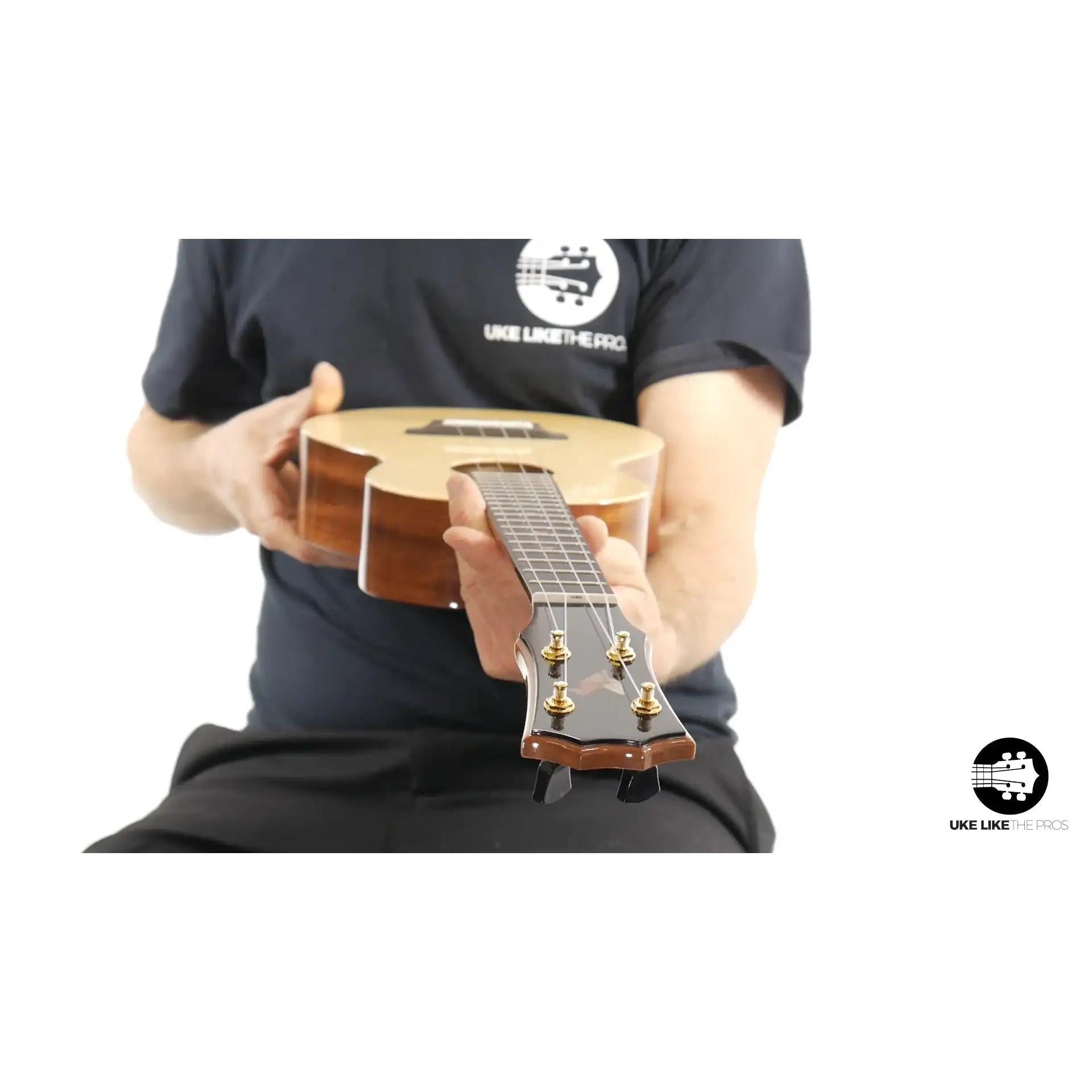 Rebel tenor ukulele with double cheese wood body, front view, Terry Carter Music Store