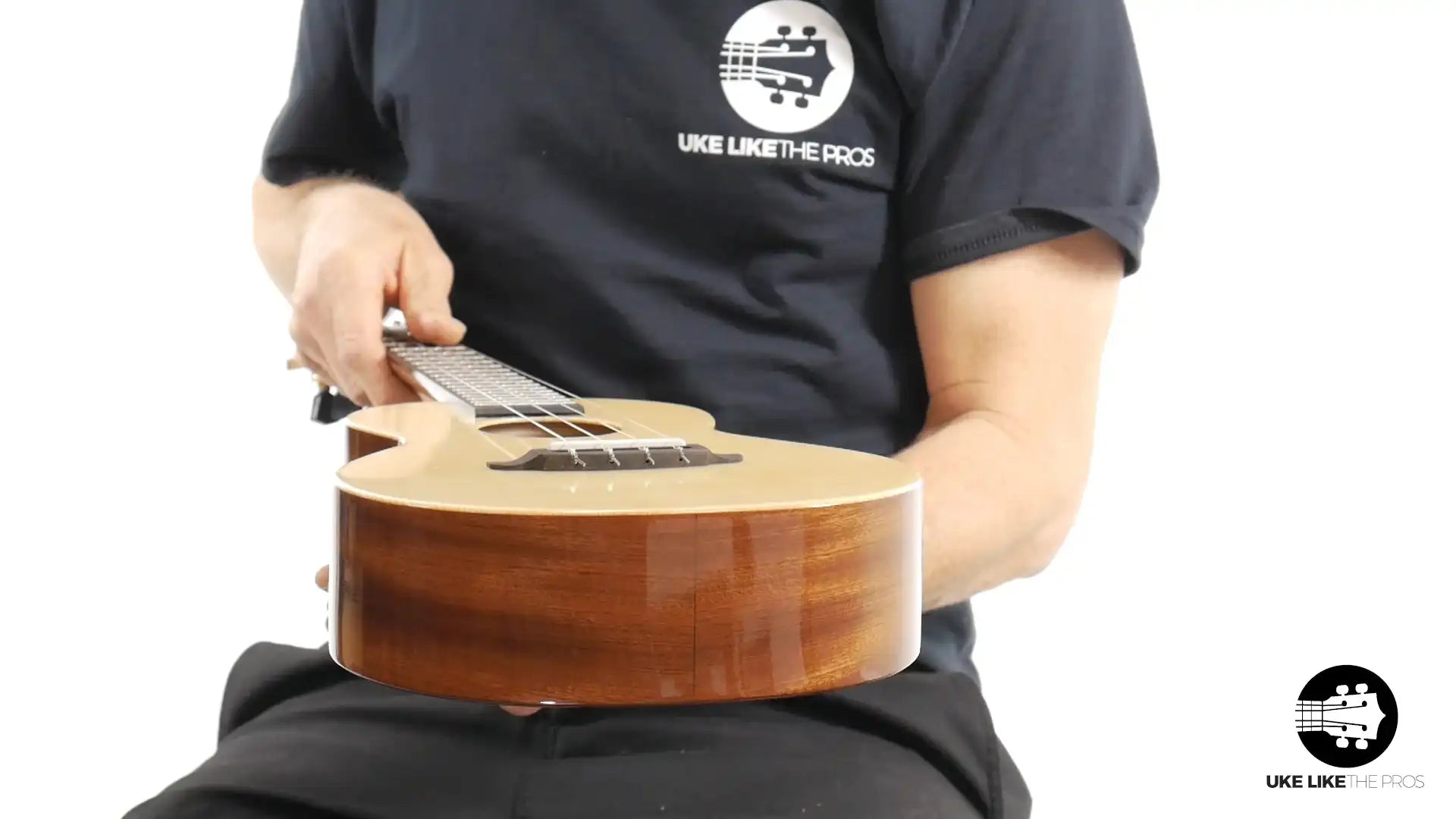 Rebel Double Cheese tenor ukulele with natural wood finish, featured at Terry Carter Music Store