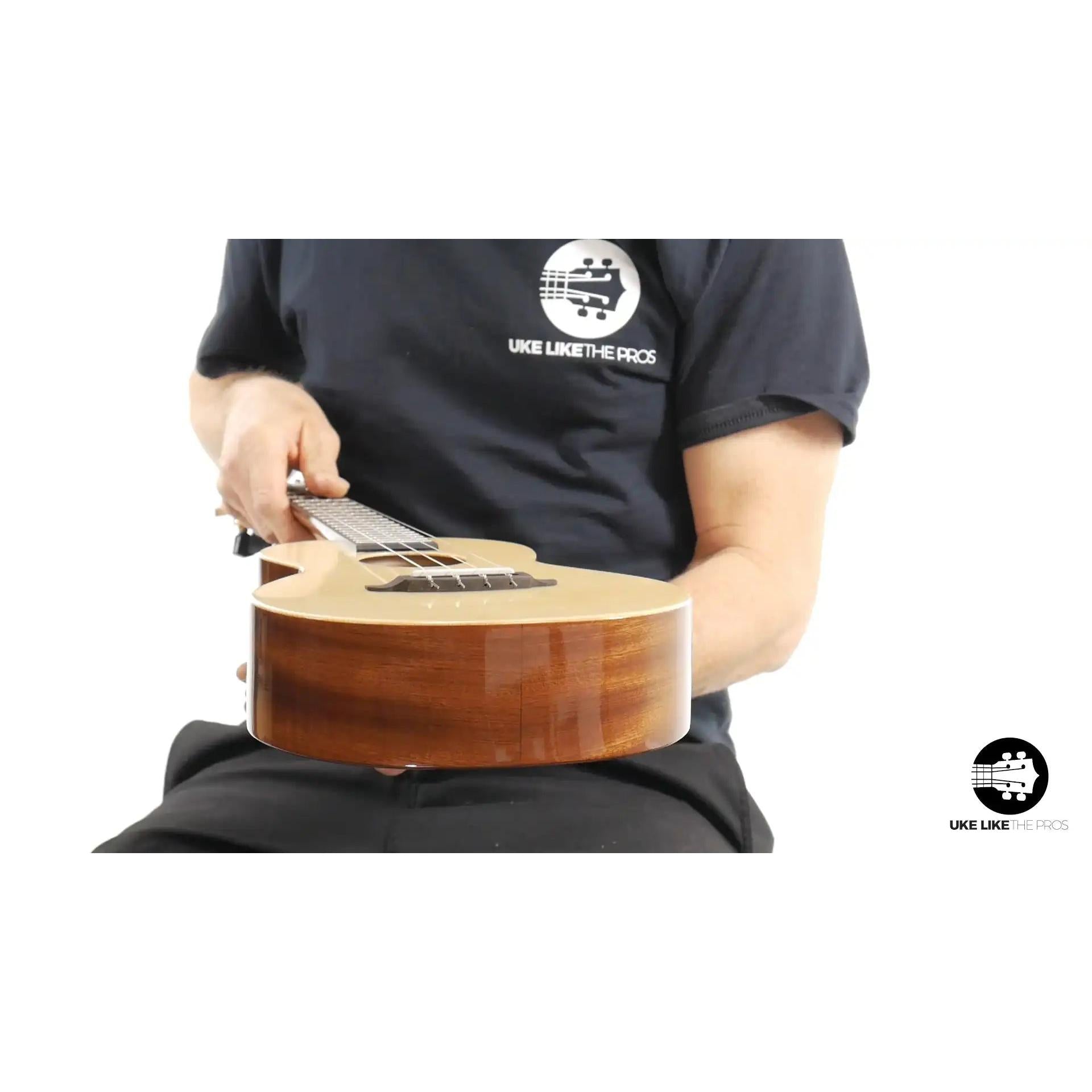 Rebel Double Cheese tenor ukulele with natural wood finish, featured at Terry Carter Music Store