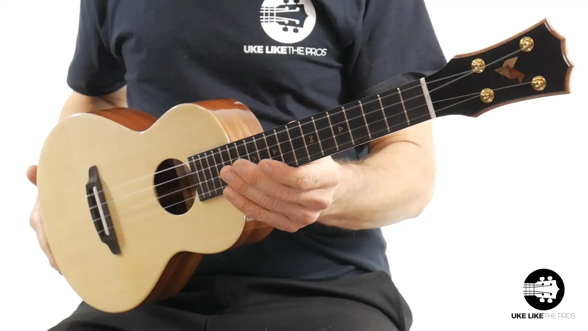 Rebel Double Cheese Tenor ukulele with spruce top and dark headstock at Terry Carter Music Store