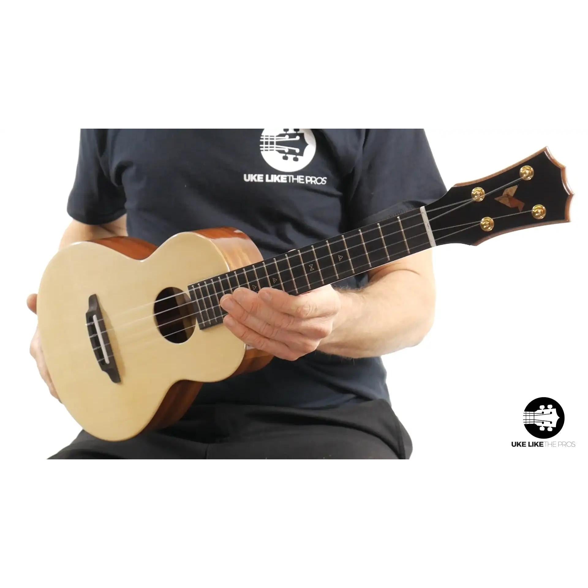 Rebel Double Cheese Tenor ukulele with spruce top and dark headstock at Terry Carter Music Store